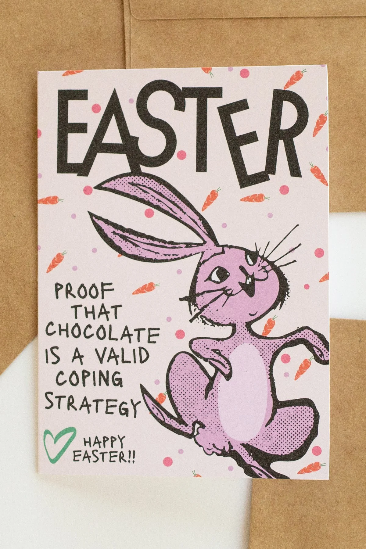 Funny 'Easter is Proof' card with illustrated easter bunny, carrots and polka dots, "Proof that chocolate is a valid coping strategy."