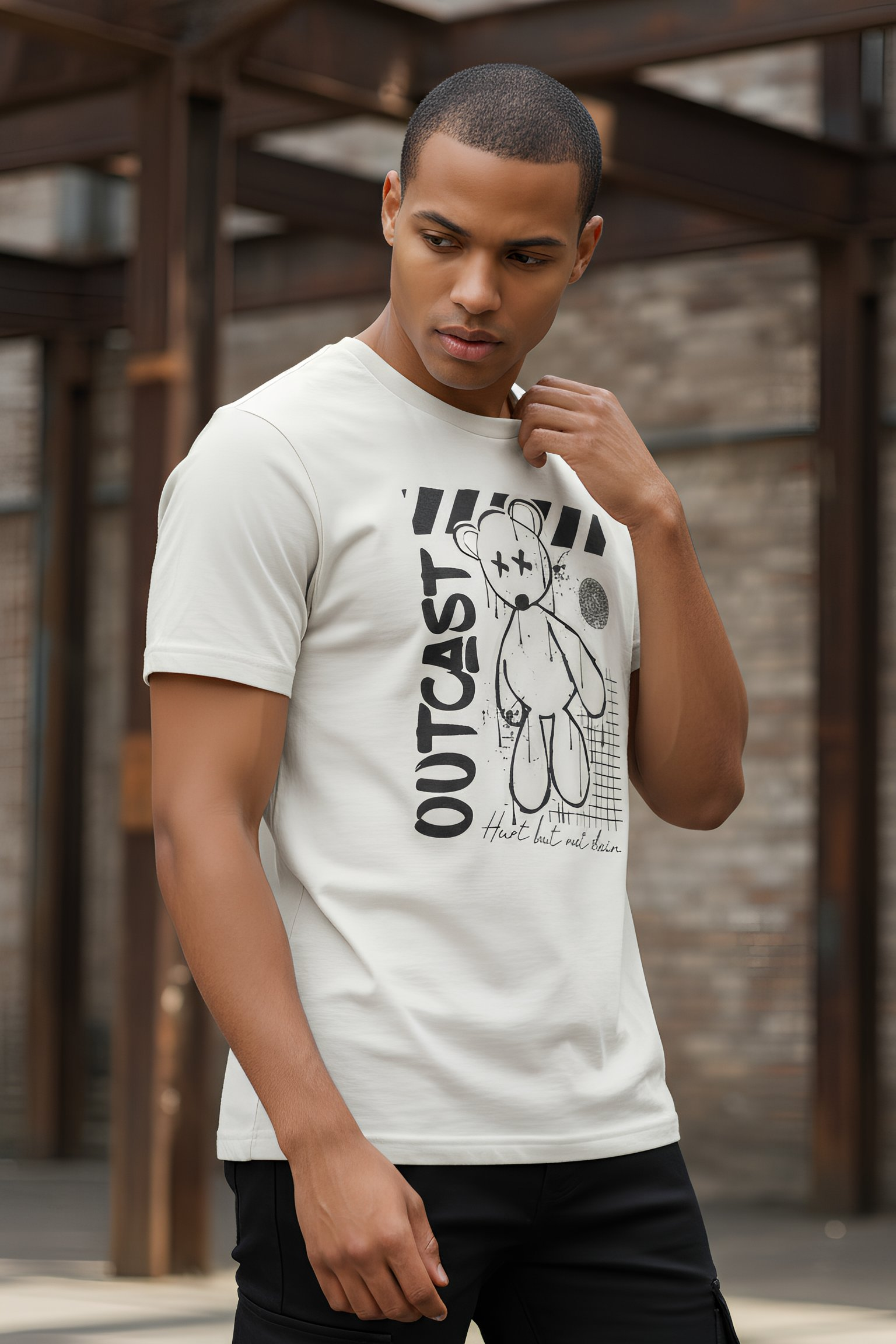 off-white tshirt with bold graphic of graffiti teddy bear representing being a black sheep, or outcast
