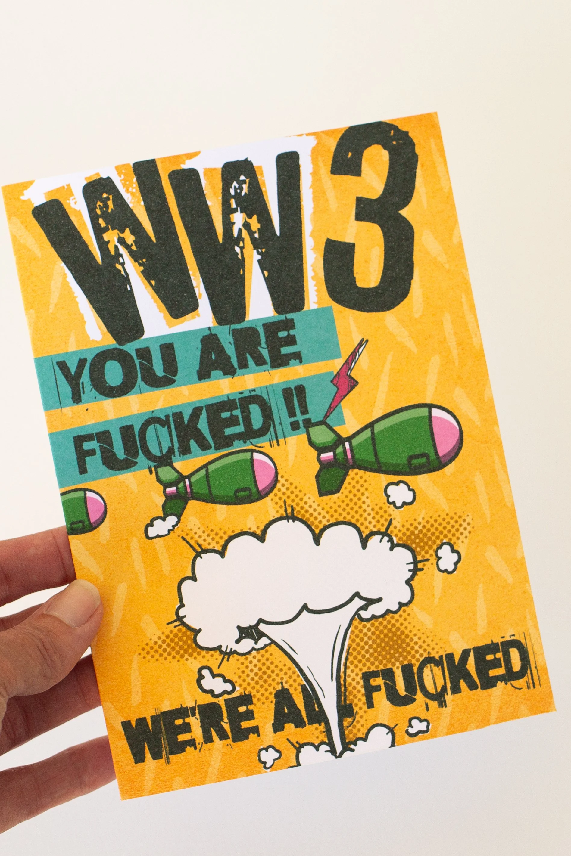 This comic-style bombs & mushroom cloud humor card is available wholesale - perfect for when life feels apocalyptic.