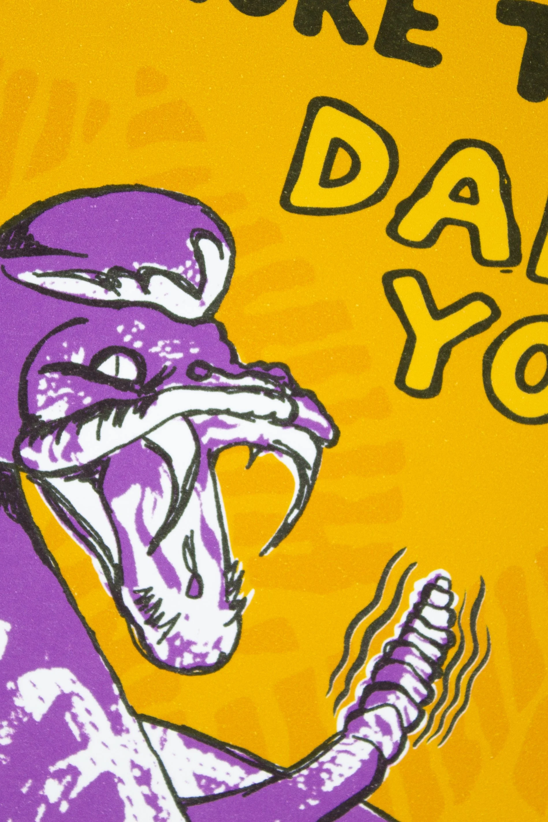 bold graphic of a coiled rattlesnake poised to strike