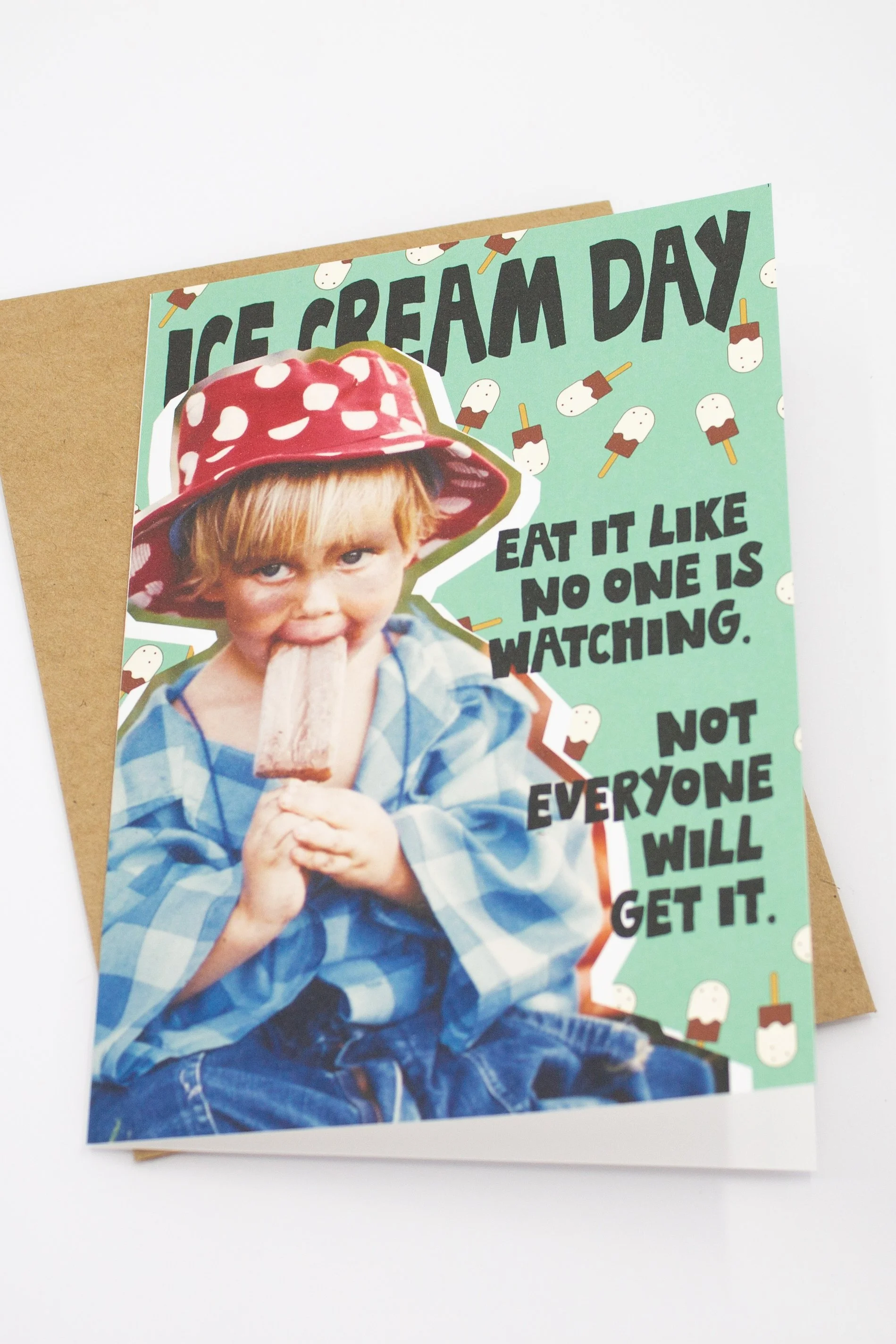 Humorous and silly National Ice Cream Day card with light colored pistachio background and ice cream popsicles.