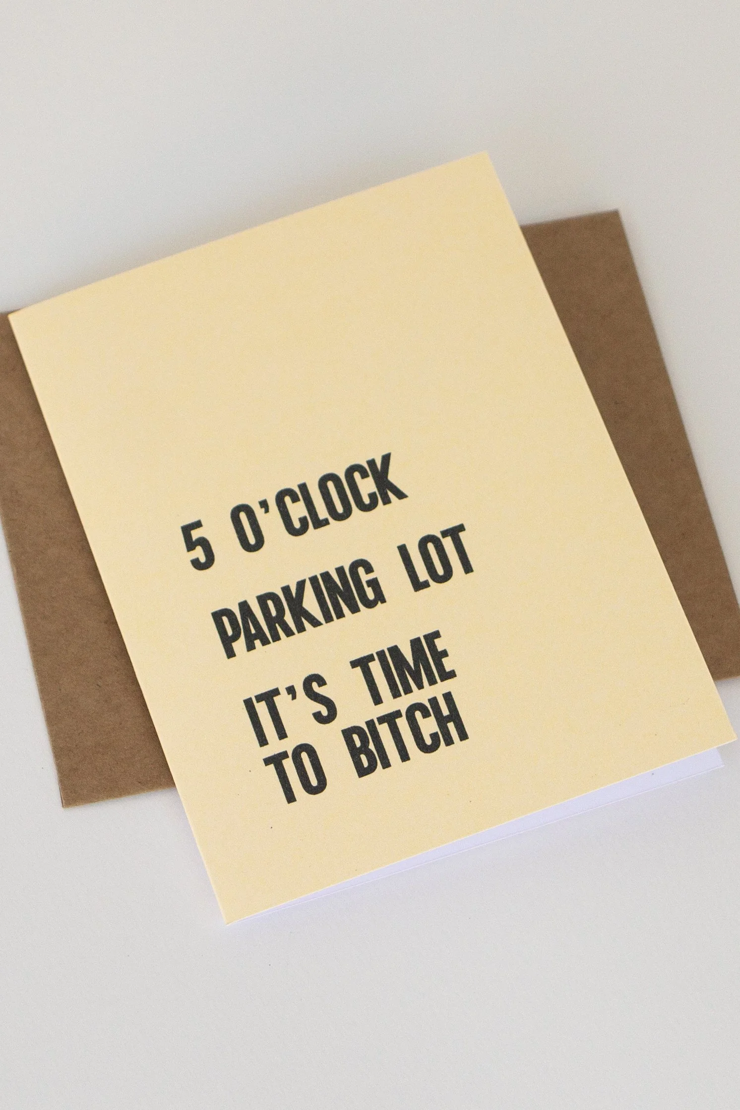 The front is a bold, text-only phrase: “5 O’Clock… Parking Lot… It’s Time to Bitch.”
