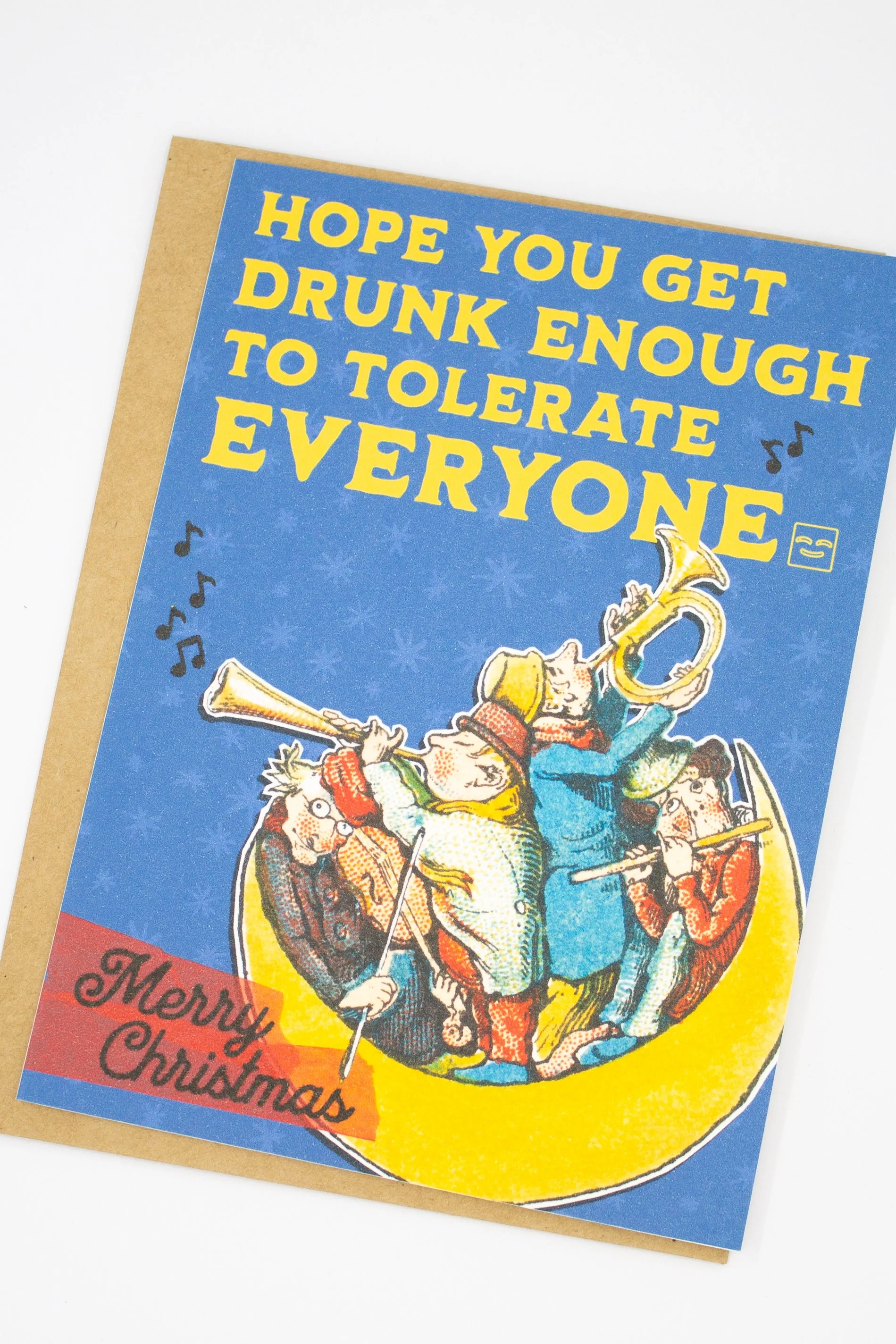 This funny Christmas greeting card features a delightfully bizarre vintage illustration of people playing musical instruments on the moon