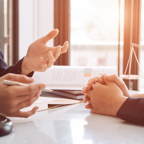 WMMT lawyer consulting with a client