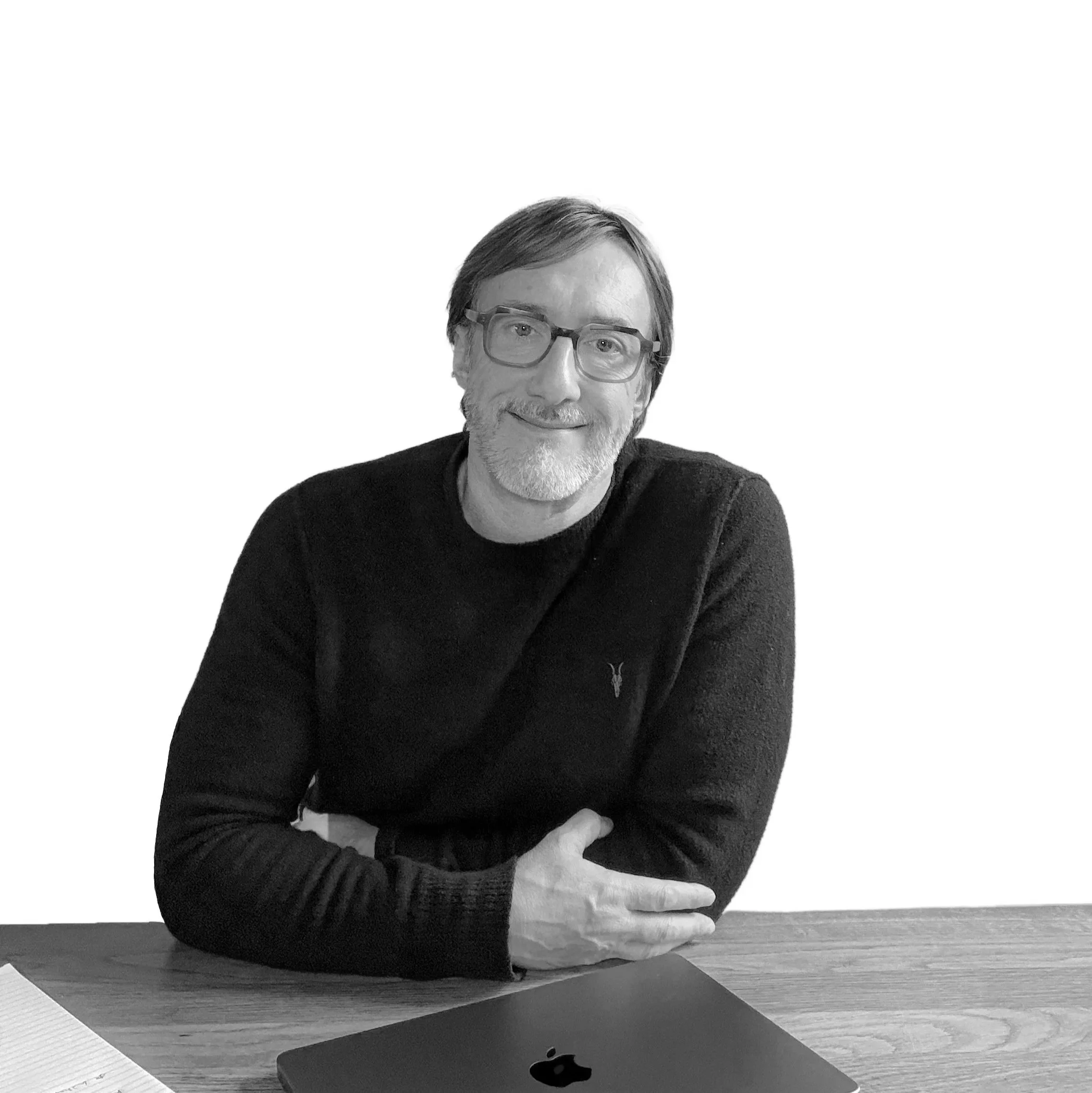 Dean Coates sitting at a desk
