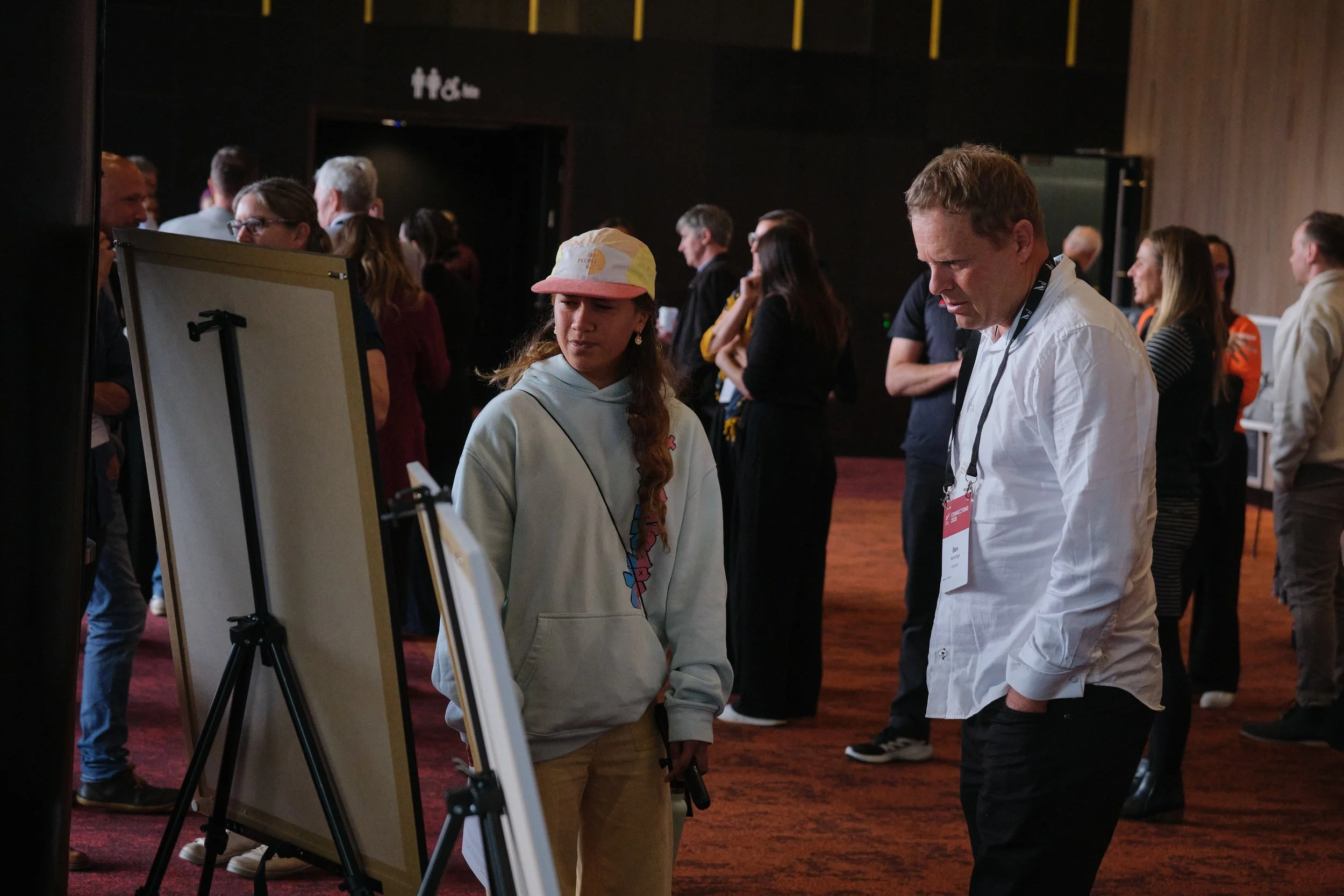 Te Waiotu Fairlie sharing the exhibition with Surfing NZ Chief Executive Ben Kennings in Wellington