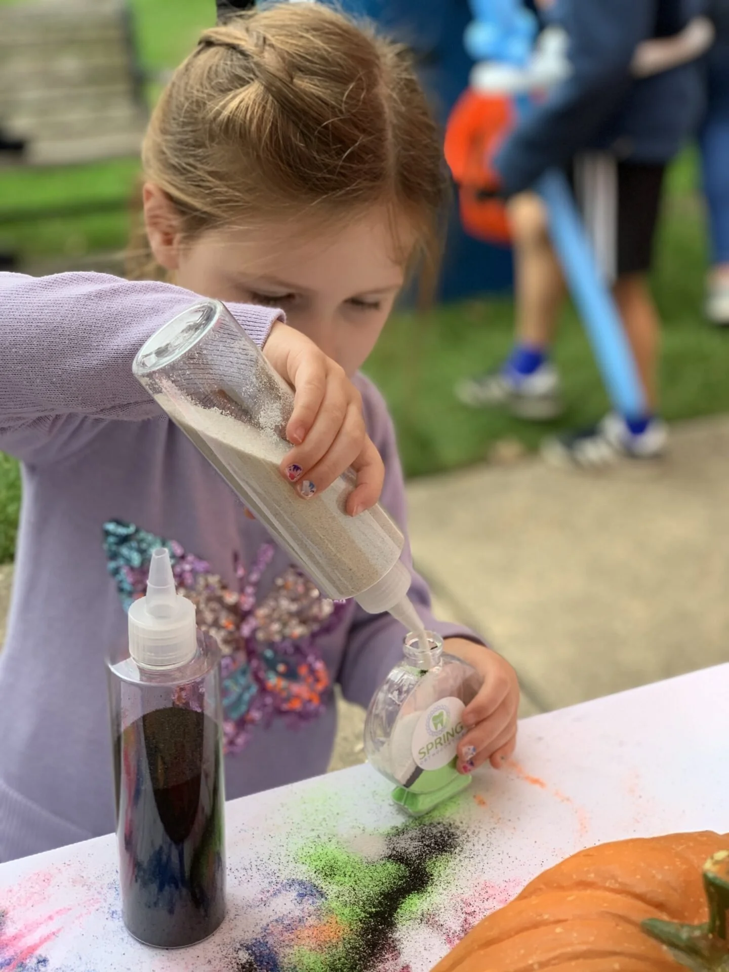 We had so much fun at the Fall Fest in Western Springs! The kids made the cutest sand pumpkins.