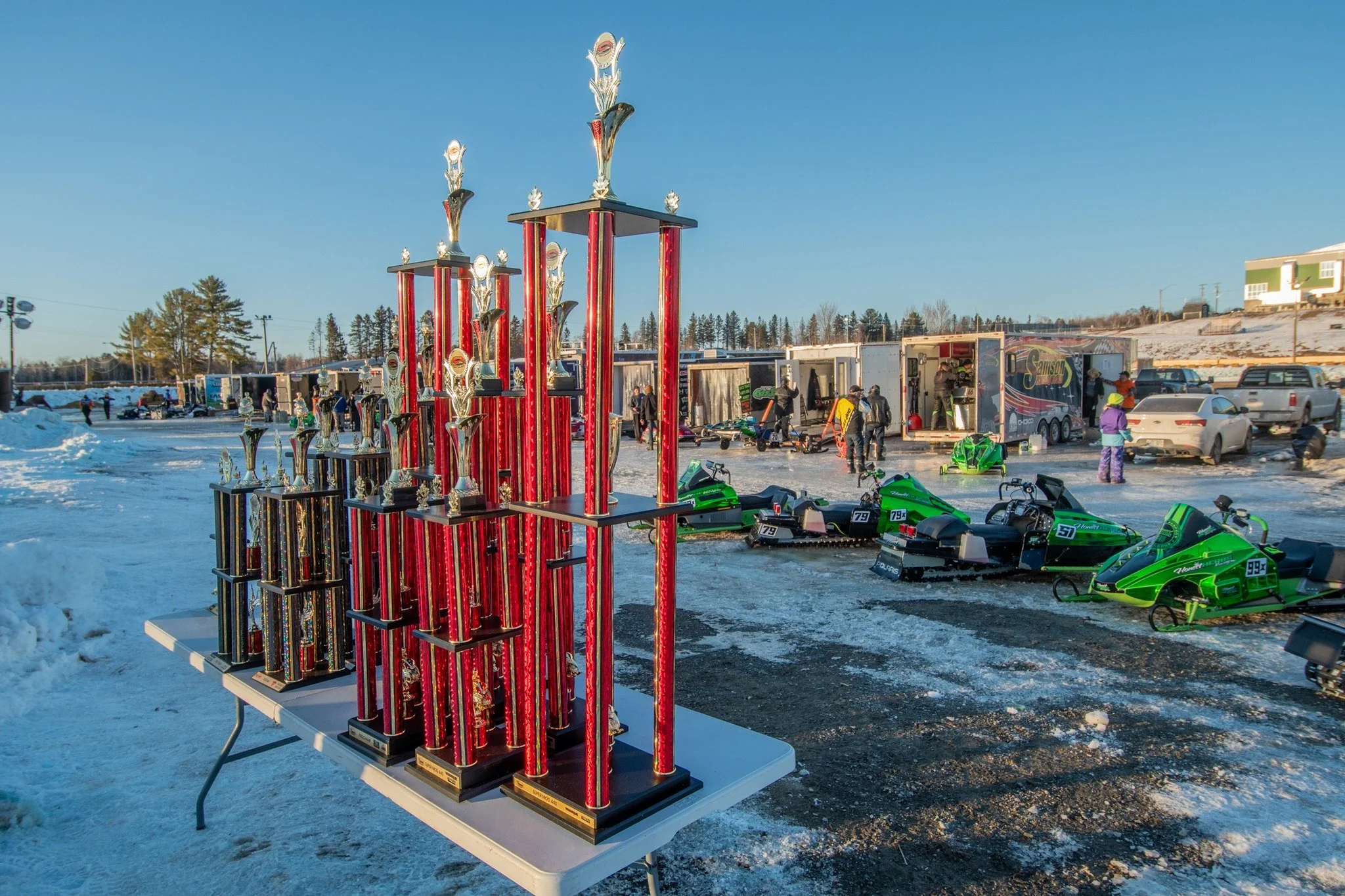 🏆🏁 What a line up. Nice row of trophies and race sleds 🔥