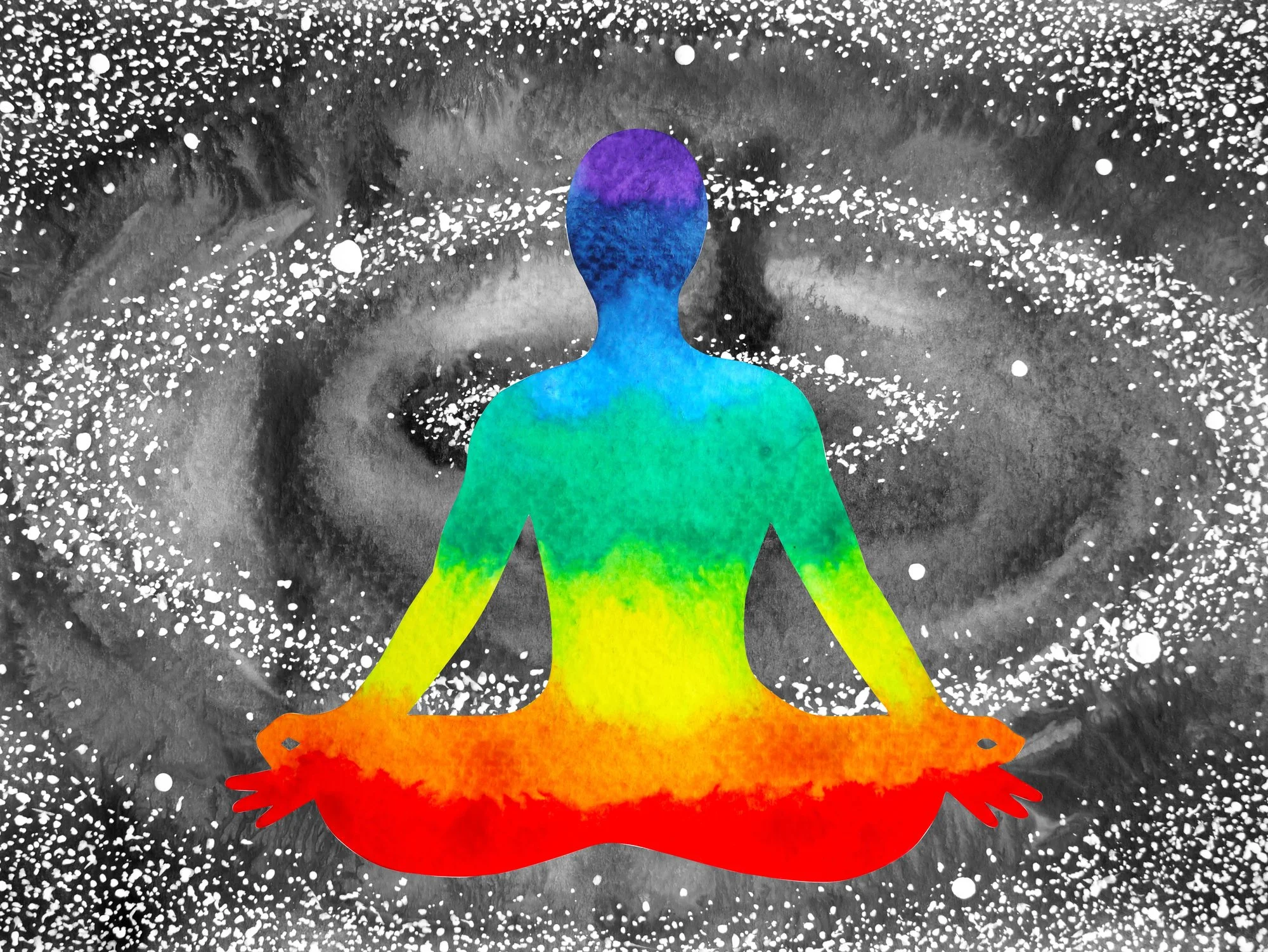 Silhouette of a person in a meditative pose with a rainbow gradient, sitting cross-legged on a dark, speckled background with white splatters.