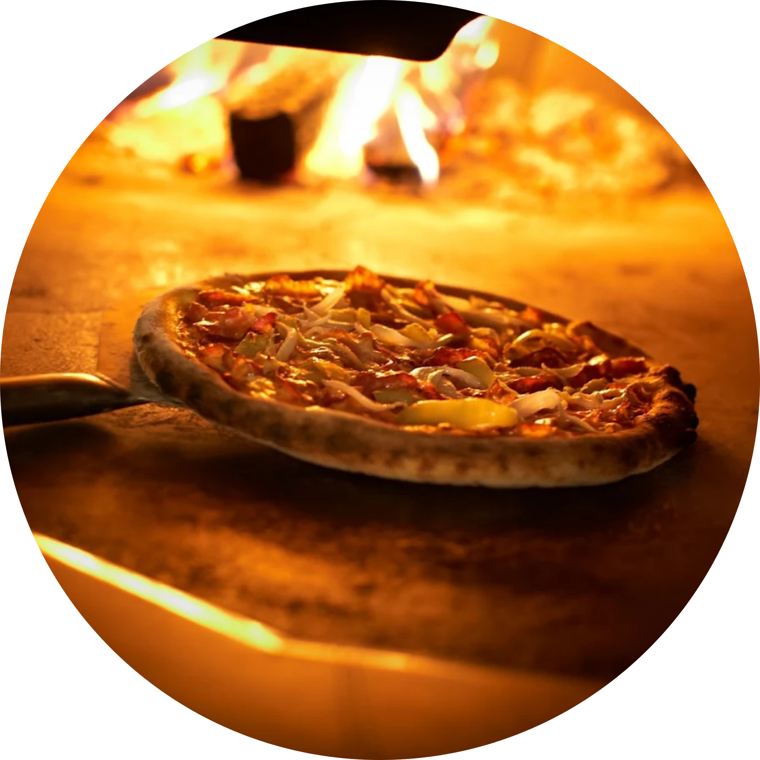 Pizza baking in a wood-fired oven.