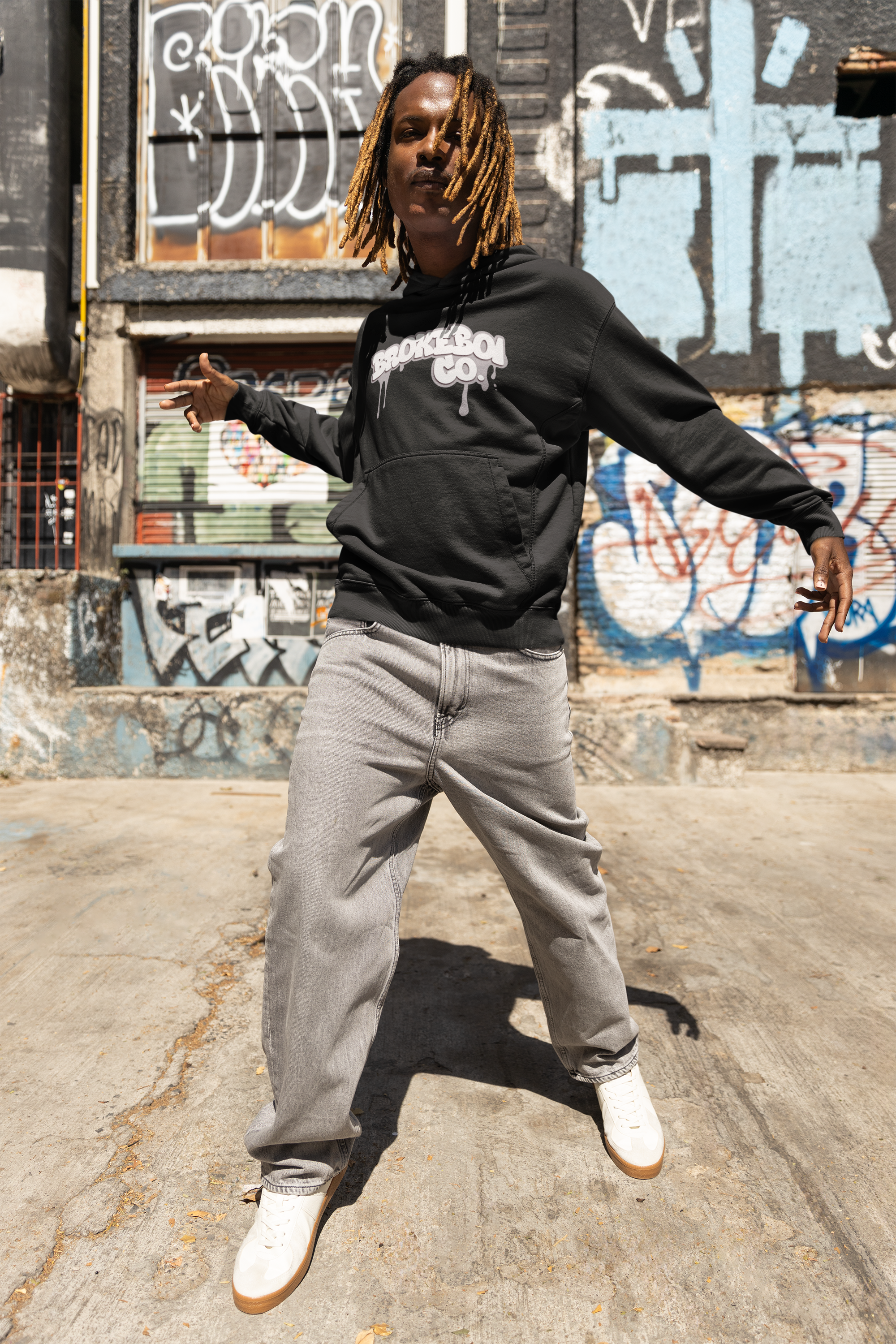pullover-hoodie-mockup-of-a-hip-hop-dancer-man-posing-in-the-street-m39216.png