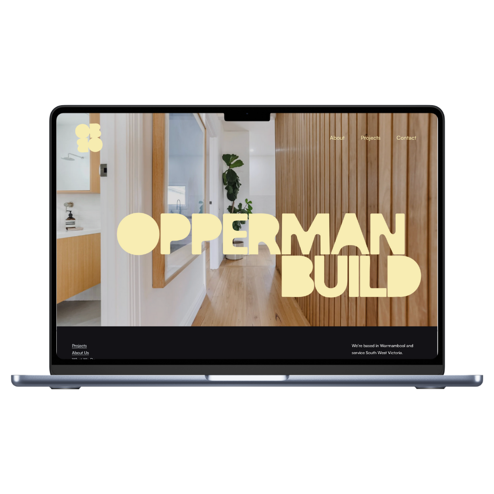 A laptop displaying a website for a build company called 'OPPERMAN BUILD' with a background image of a modern wooden and white interior space and navigation menu including About, Projects, Contact.