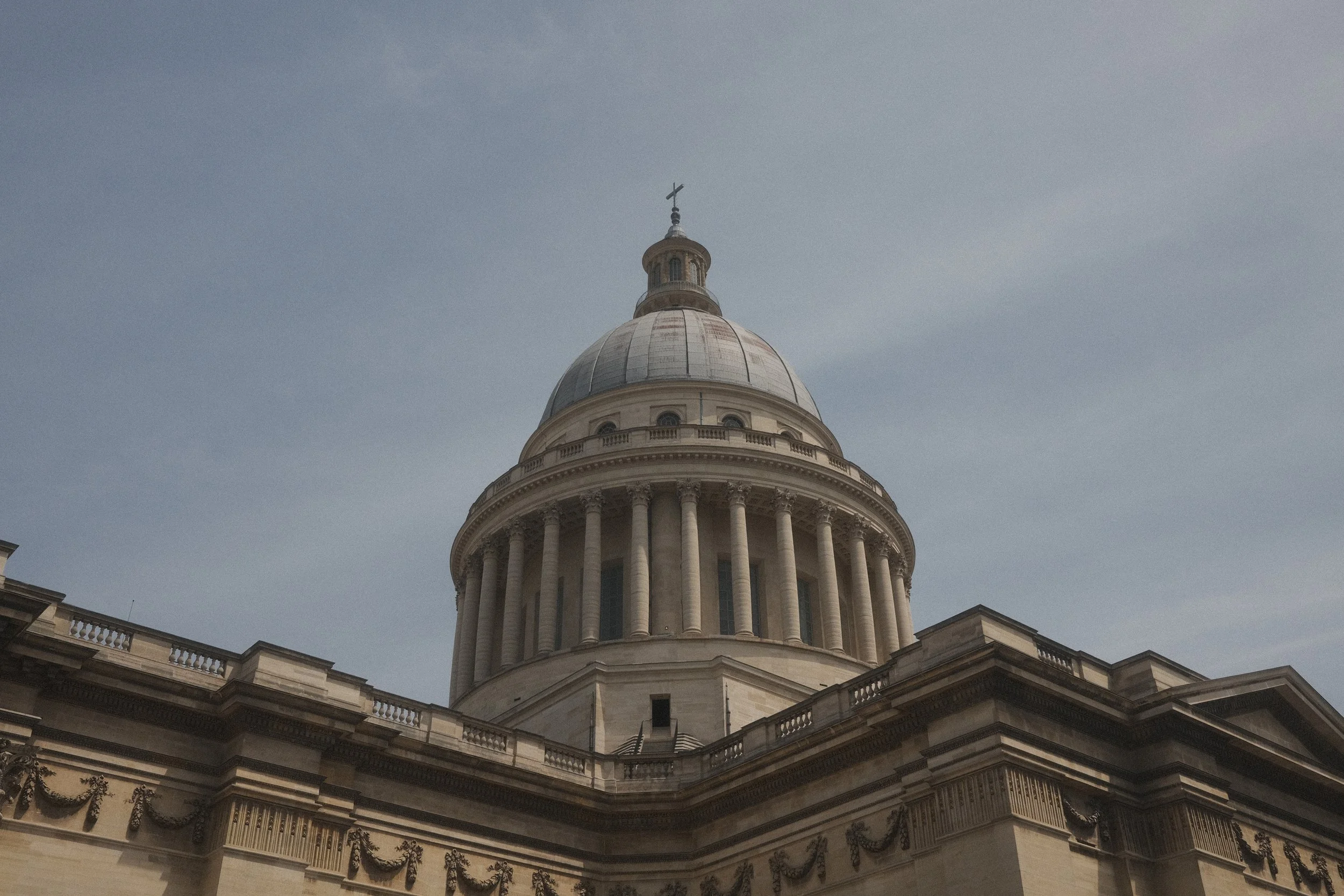 The Capitol building in Washington, D.C. with a clear blue sky in the background.