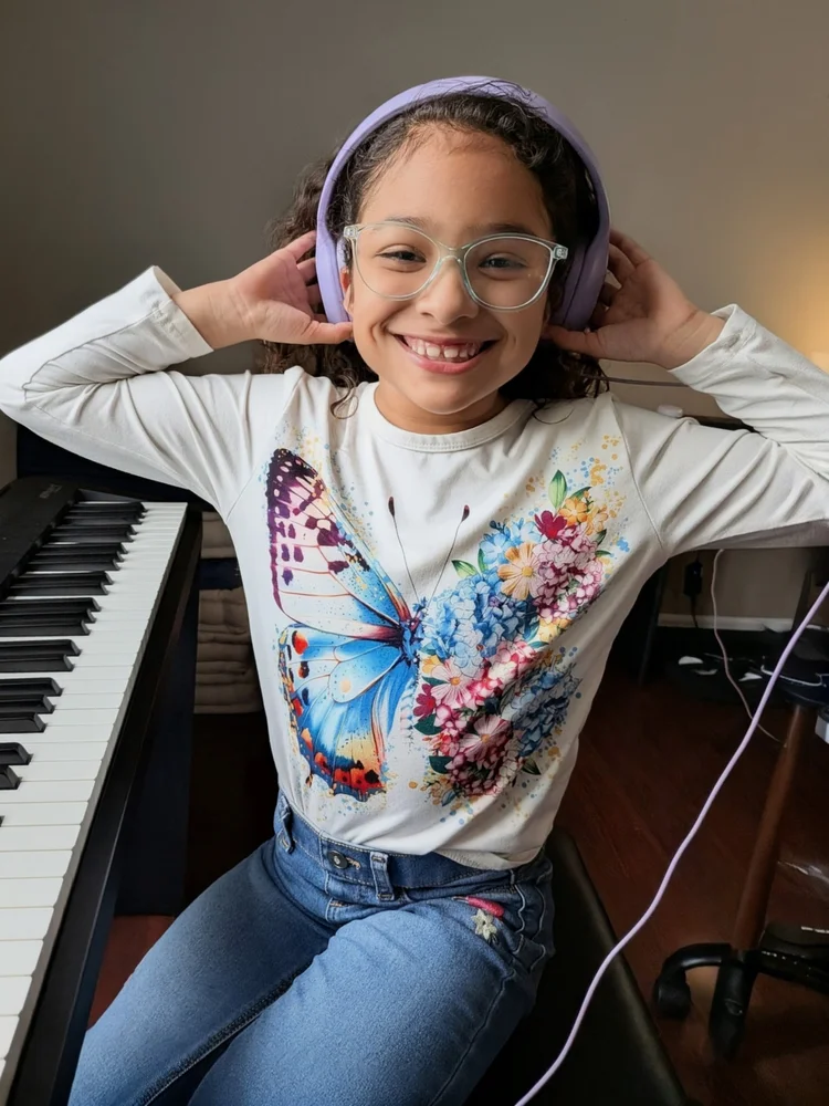 Happy piano student at Grace's Piano Studio in Fort Wayne