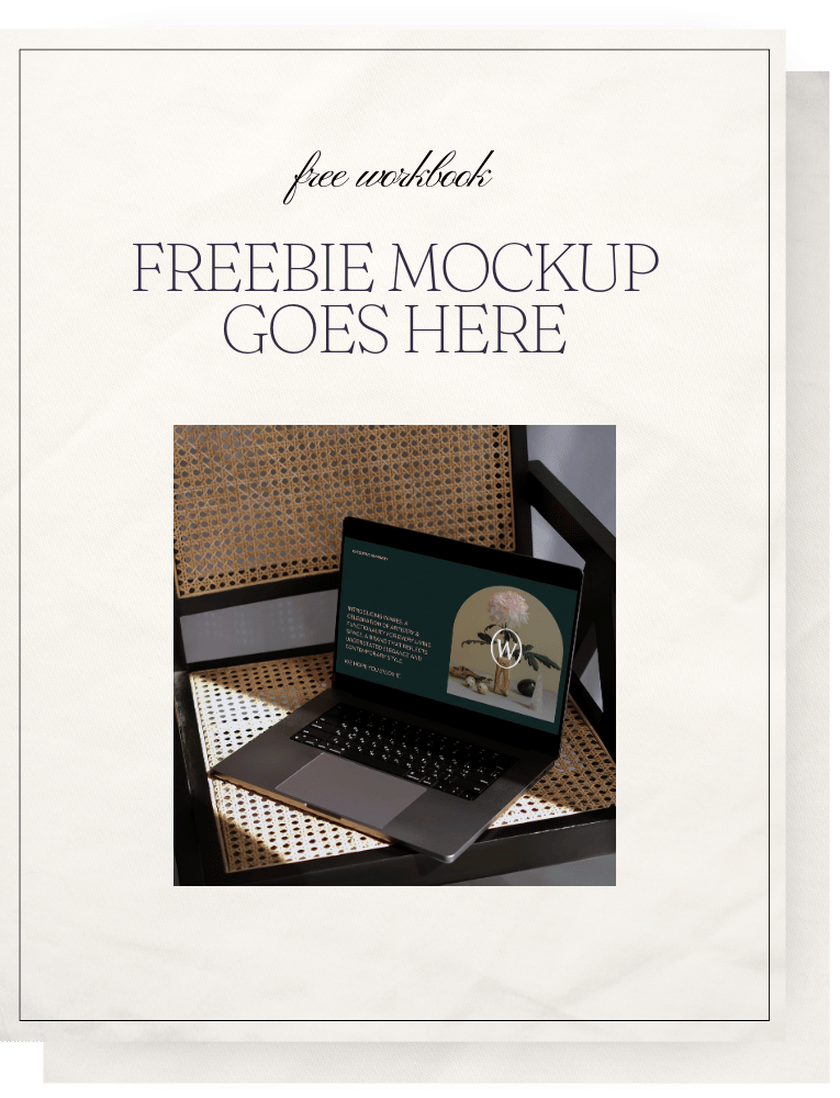 A mockup of a webpage titled 'free workbook' with placeholder text 'FREEBIE MOCKUP GOES HERE' and an image of a laptop on a chair showing a WordPress website design.