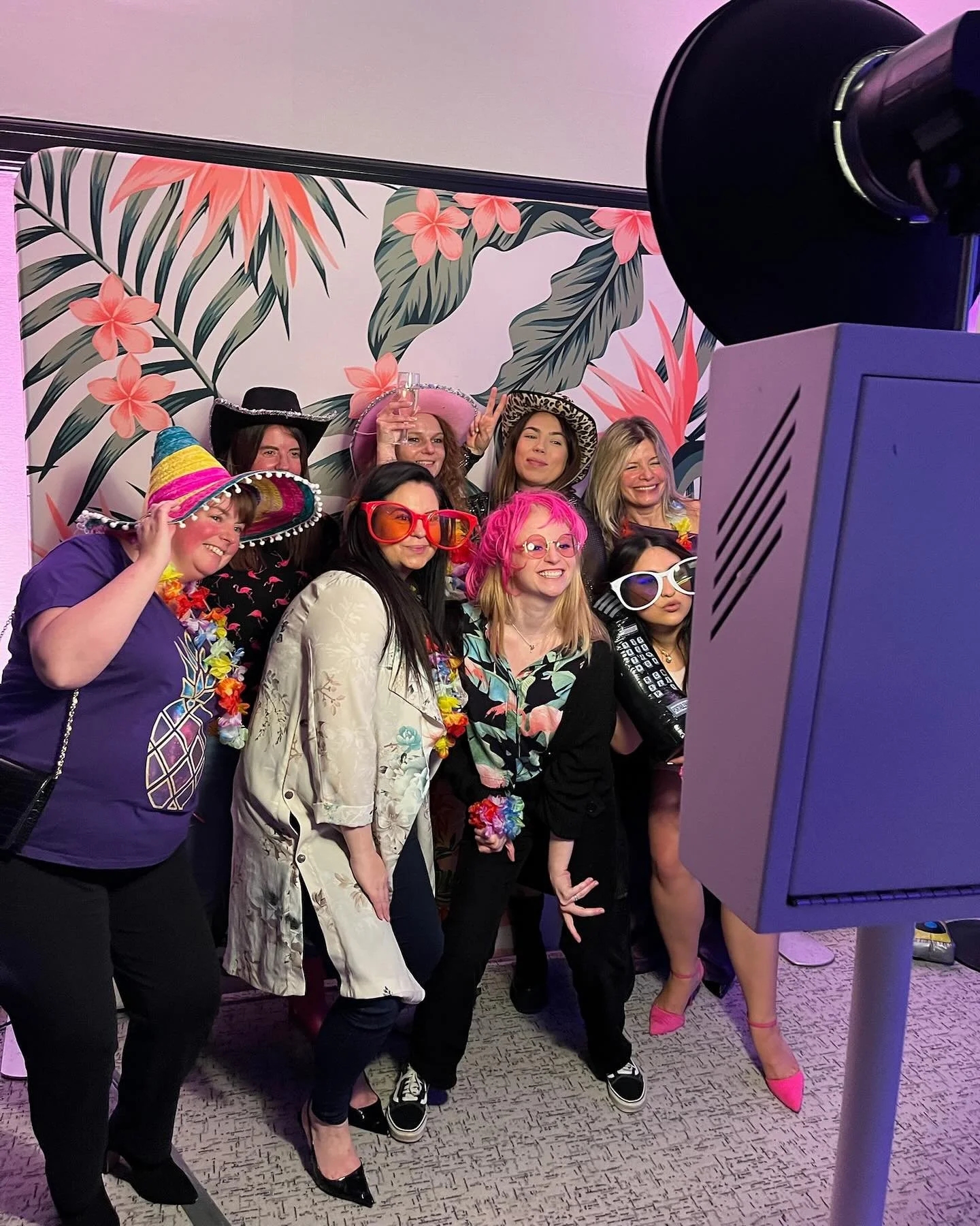 Wedding guests enjoying the photobooth