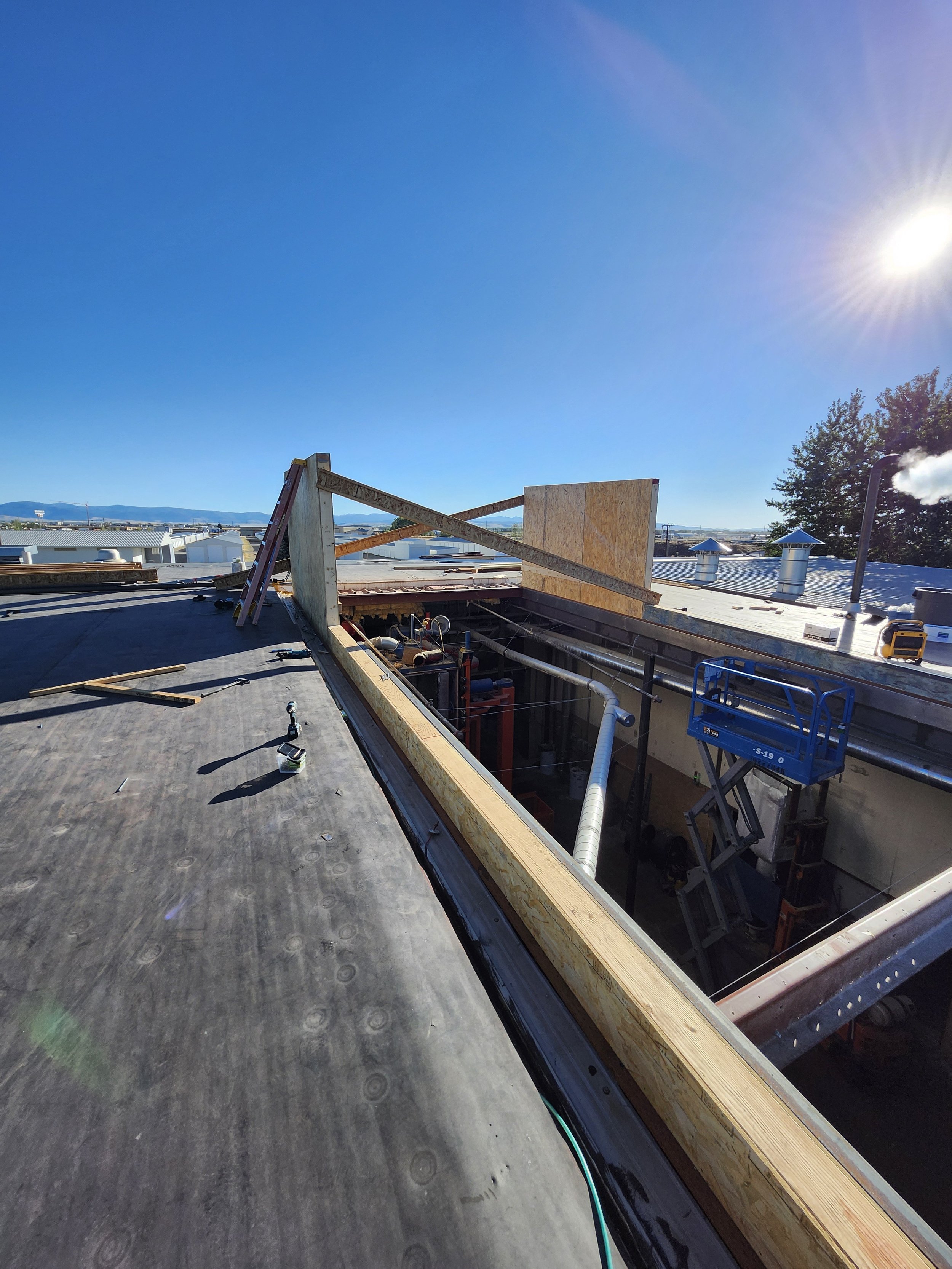 This manufacturing facility needed to add to the height of their roof to accommodate new equipment 