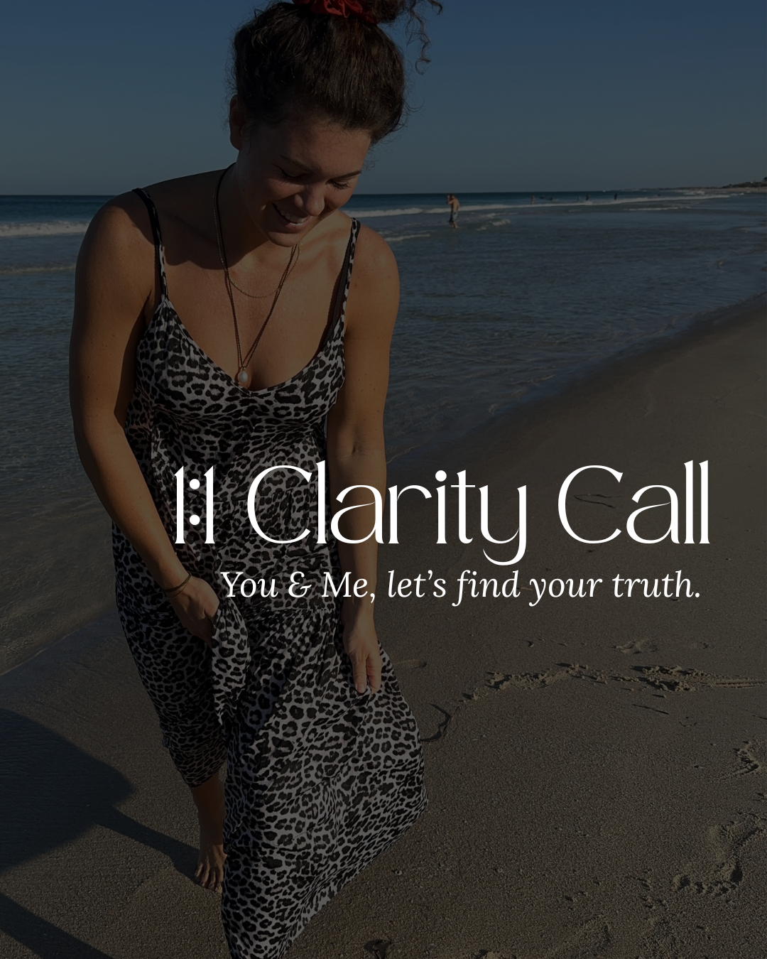 A woman with curly hair wearing a black sleeveless top, standing with one hand on her hip, smiling slightly, with text overlay promoting a one-on-one clarity call with Nicole.