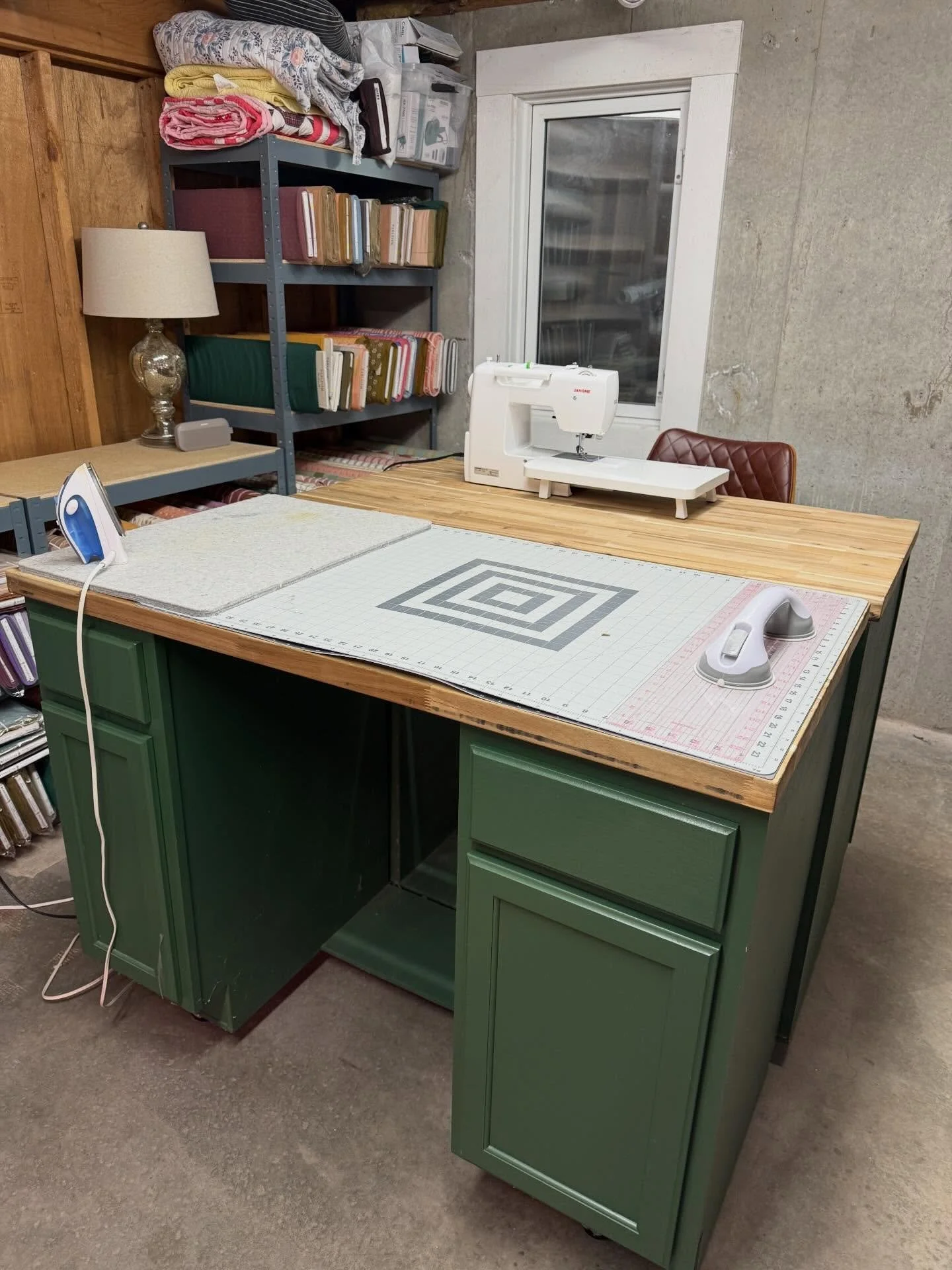 Today for #igquiltfest2026 I am giving you a peek into my basement sewing space where all the fun happens. My hubby built me this 40&rdquo; high work table and cabinet a few years ago, custom made for long quilting sessions (no more sore back 🙌) and