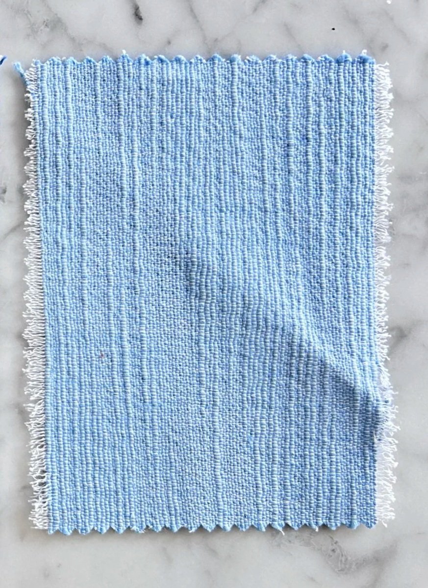 Monroe, Sky. Certification: GOTS, the Global Organic Textile Standard. Content: 100% organic cotton. Directionality:Railroaded**. Weight: 10.0 oz yd2 / 515 gm m2. Width: 54" / 137 cm
