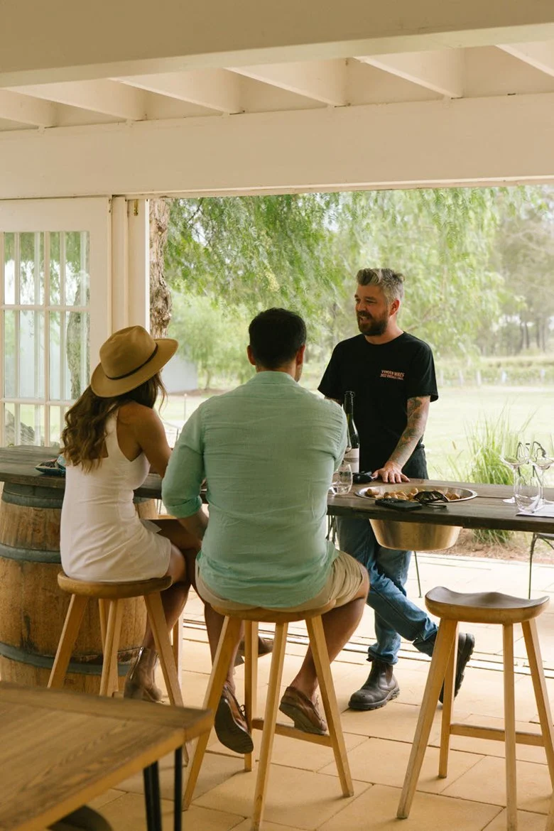 Luxury wine tour guests dining at a fine restaurant in Pokolbin, Hunter Valley