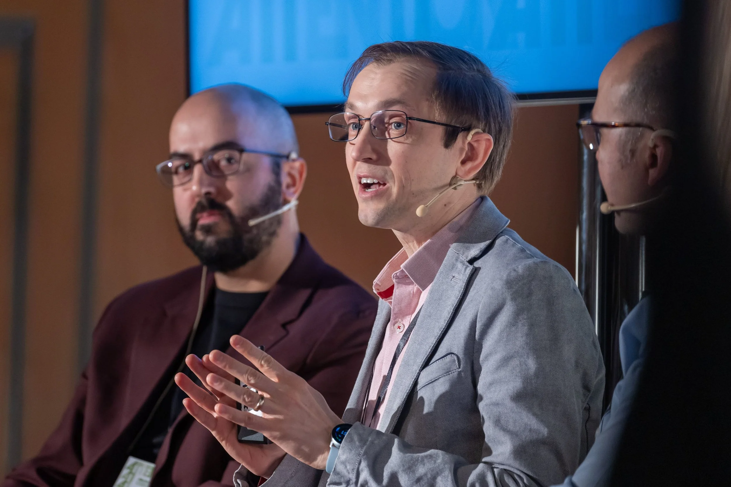 Anatoliy Gruzd, Co-Director of the Social Media Lab, speaks while Alexei Sisulu Abrahams, Digital Trace Team Lead at MEO, listens