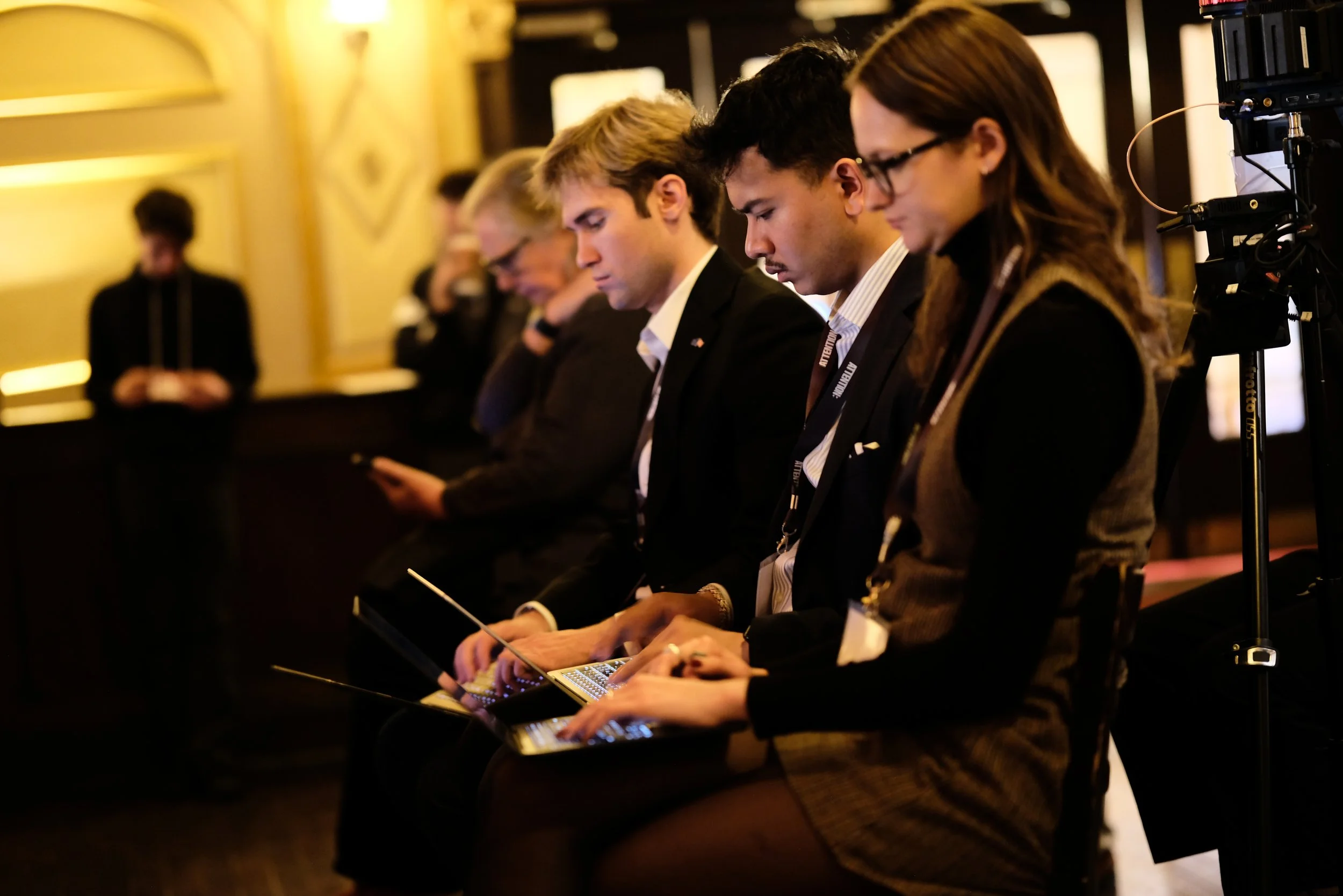 Youth Fellows at the Centre for Media, Technology and Democracy take notes during a panel.