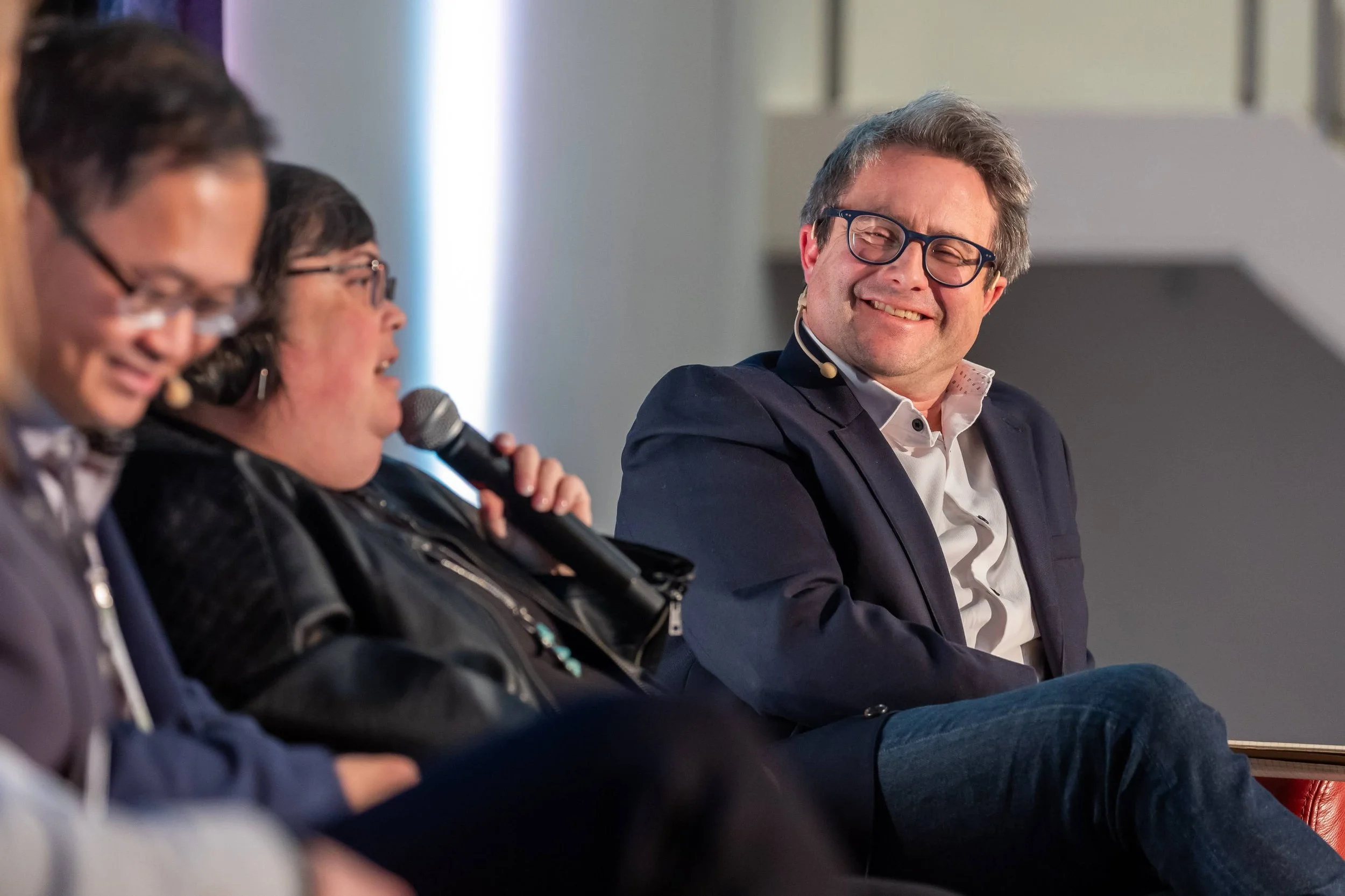 Taylor Owen, Director of Centre for Media, Technology and Democracy, smiles while Joan Donovan, founder of The Critical Internet Studies Institute, speaks