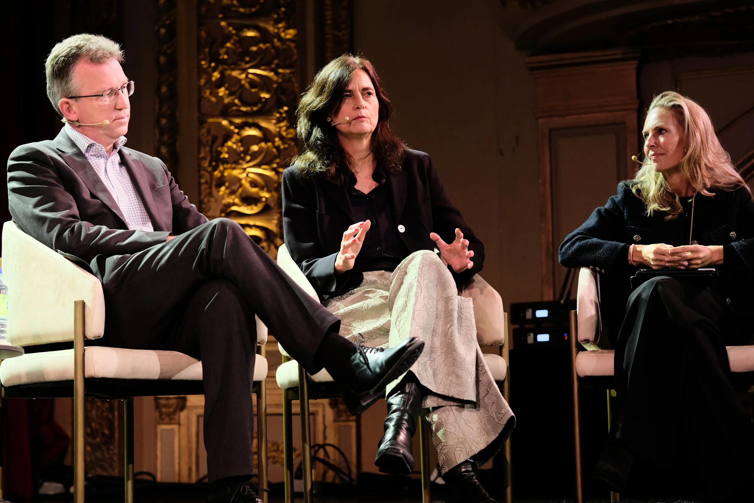 Alexandra Geese, Member of the European Parliament, speaks as her fellow panelists Jeremy Wright, former UK Secretary of State for Digital, Culture, Media and Sport, and Sasha Havlicek, Co-Founder and CEO of the Institute for Strategic Dialogue, list
