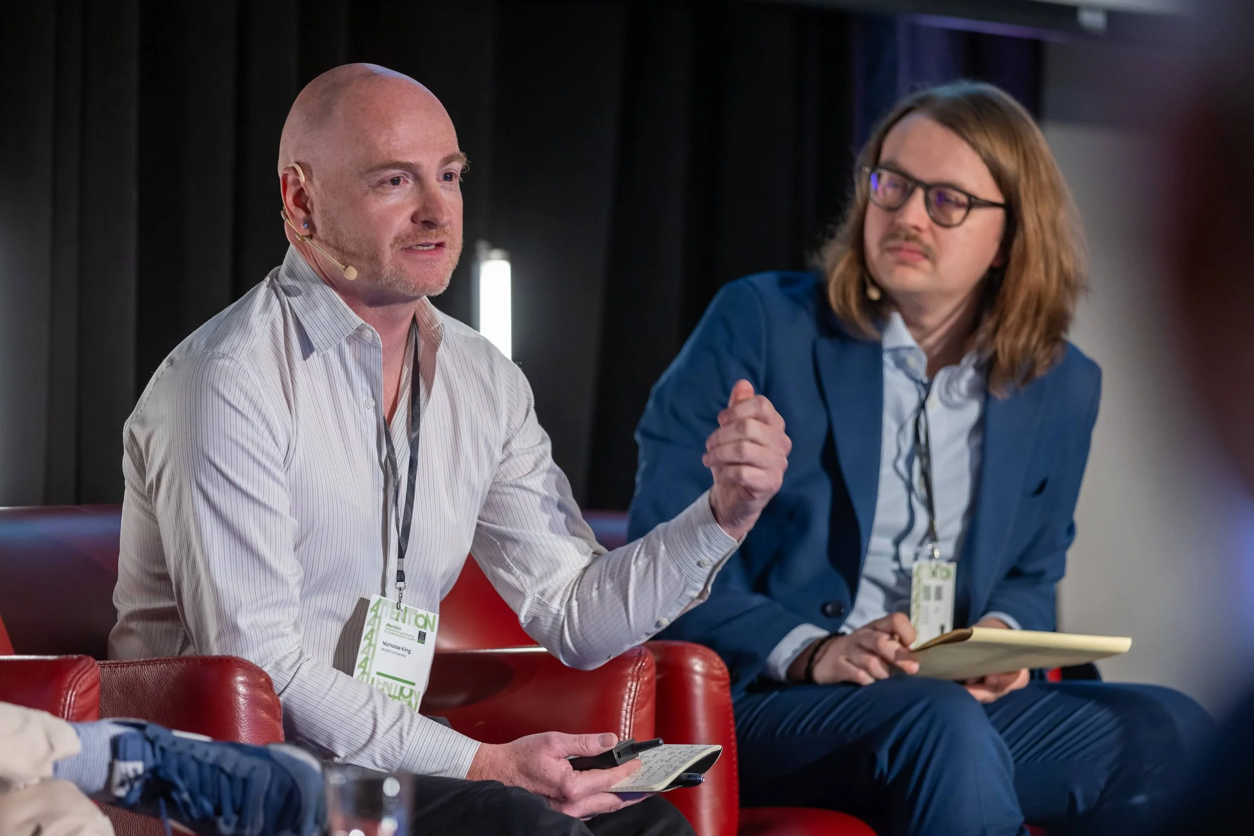Nicholas King, from the Max Bell School of Public Policy, responds to a question while Aengus Bridgman looks on