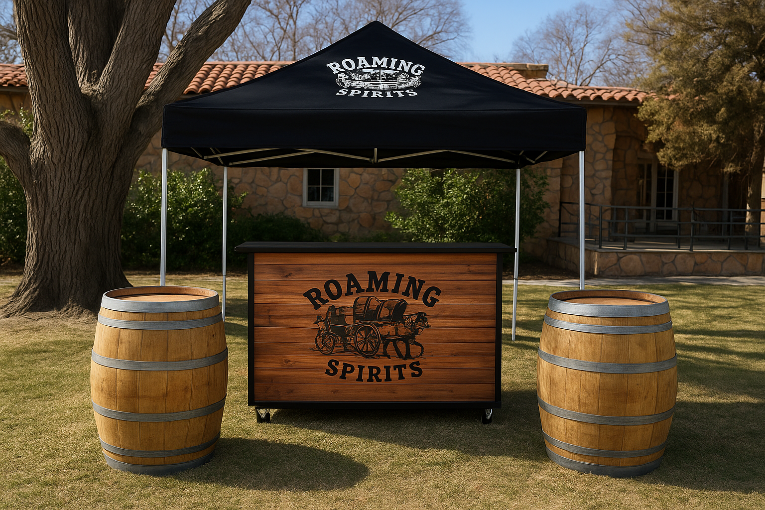 A totem-style outdoor bar with the logo 'Roaming Spirits,' flanked by two wooden barrels, under a black canopy with the same logo, set on a grassy yard in front of a stone house.