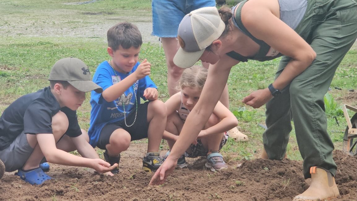 Day 2 of Farm Stewardship Camp was a blast! We learned all about seeds! We dissected a seed (bean), compared and contrasted all kinds of seeds, planted corn and sunflower seeds ate many types of seeds and seed spreads for snacks, and learned about a 