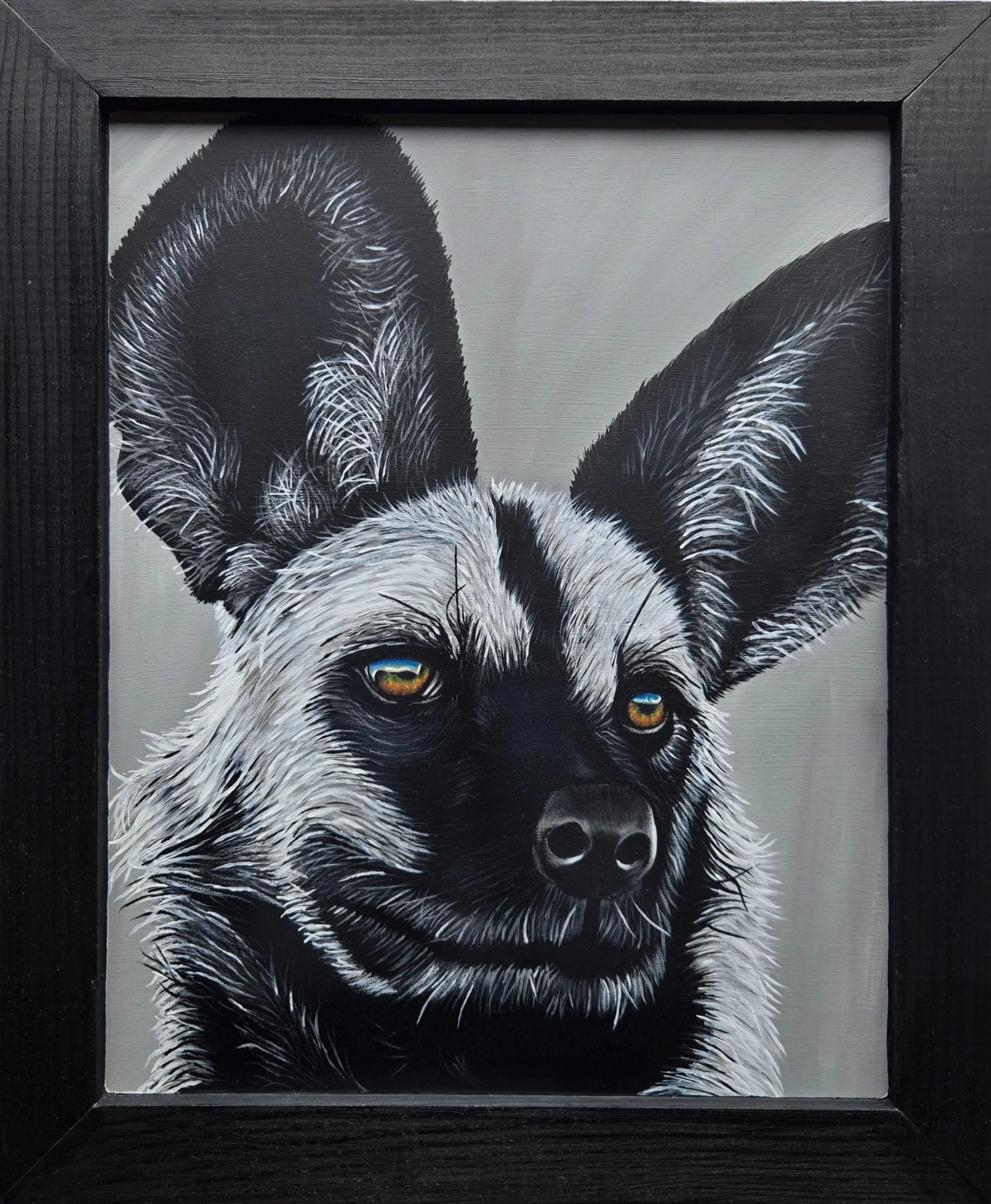 Painted Dog, fine art painting by Nate Doucette, African painted dog portrait on birch wood, 18 x 15 inches
