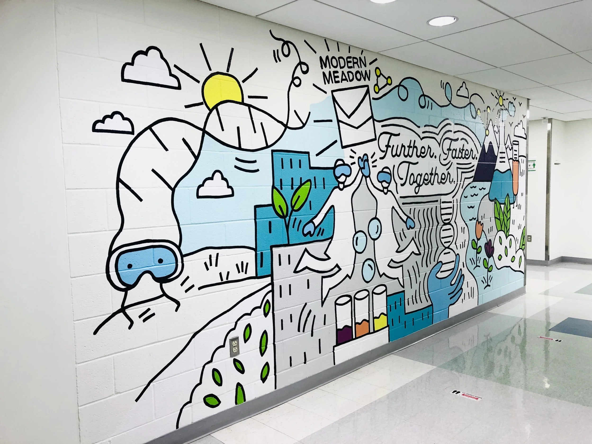 Colorful mural on a white brick wall features a large sun, mountains, trees, a building, and various abstract shapes, with phrases like 'Modern Meadow,' 'Further Faster,' and 'Together' written on it.