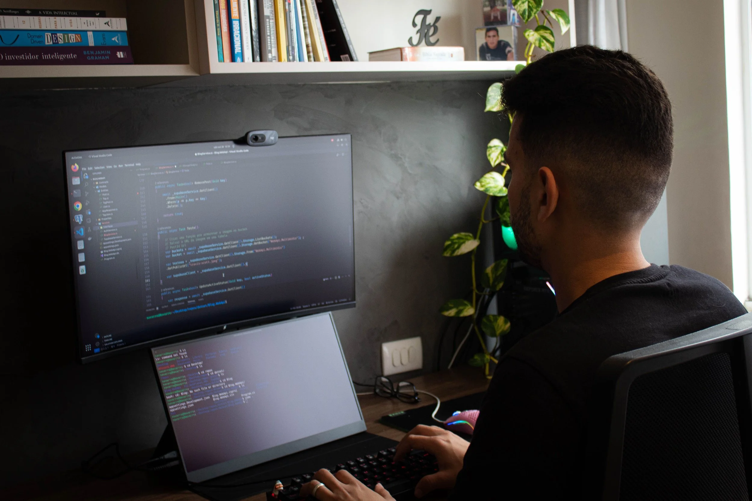 Developer implementing website analytics event tracking from a documented measurement plan