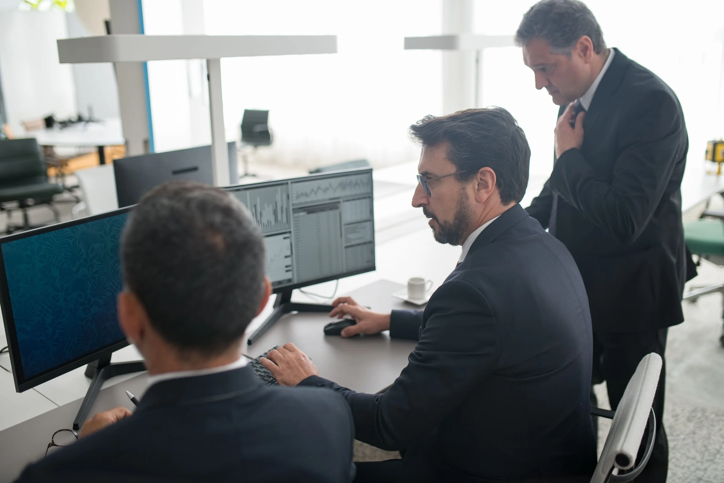 Marketing professionals using live analytics data to make faster performance decisions