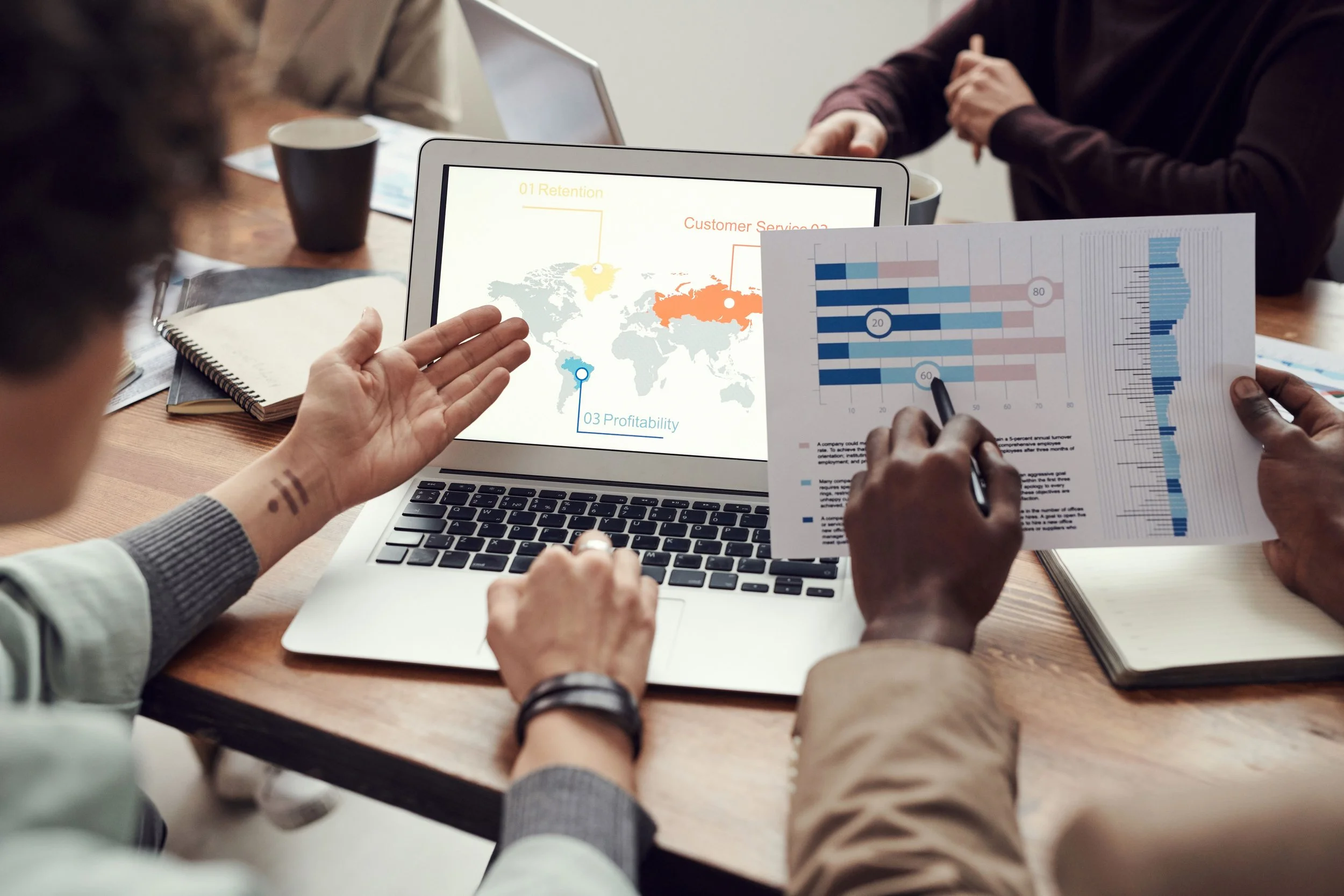 Analytics team reviewing connected customer data for identity resolution