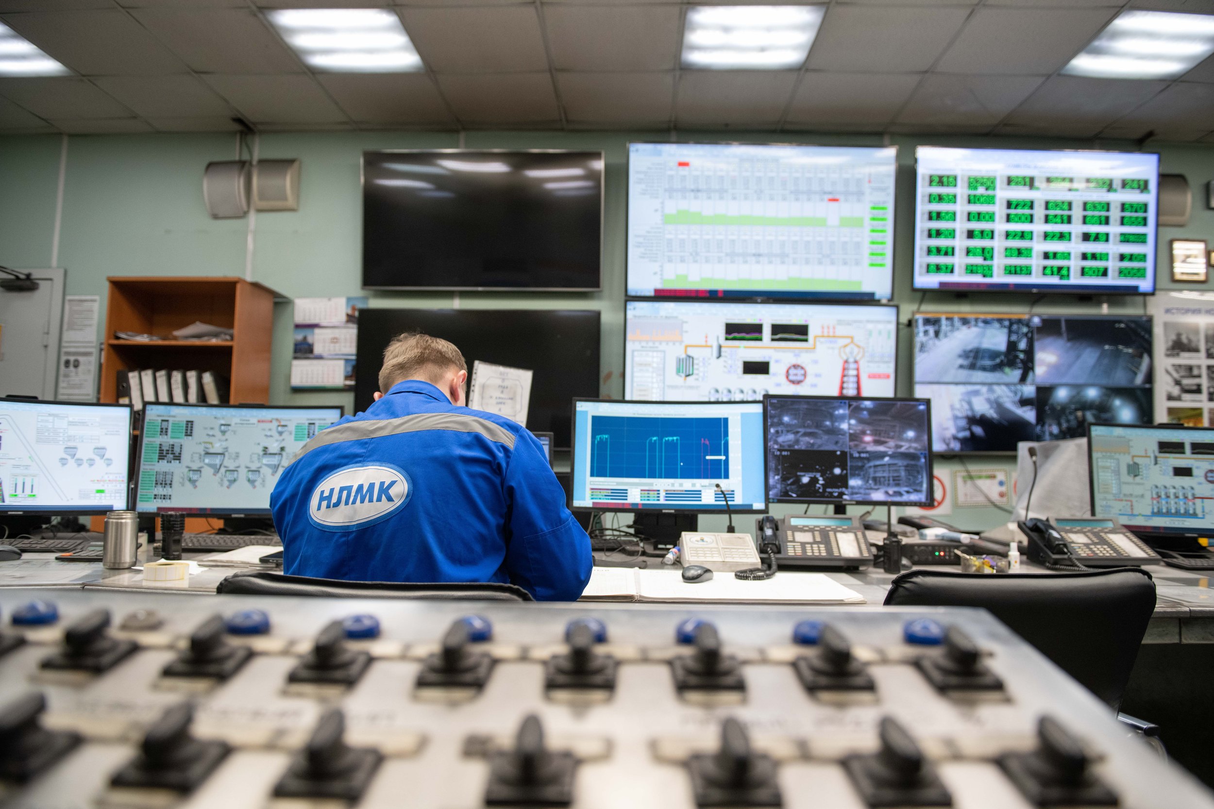 Professional monitoring multiple screens to detect analytics and data quality issues