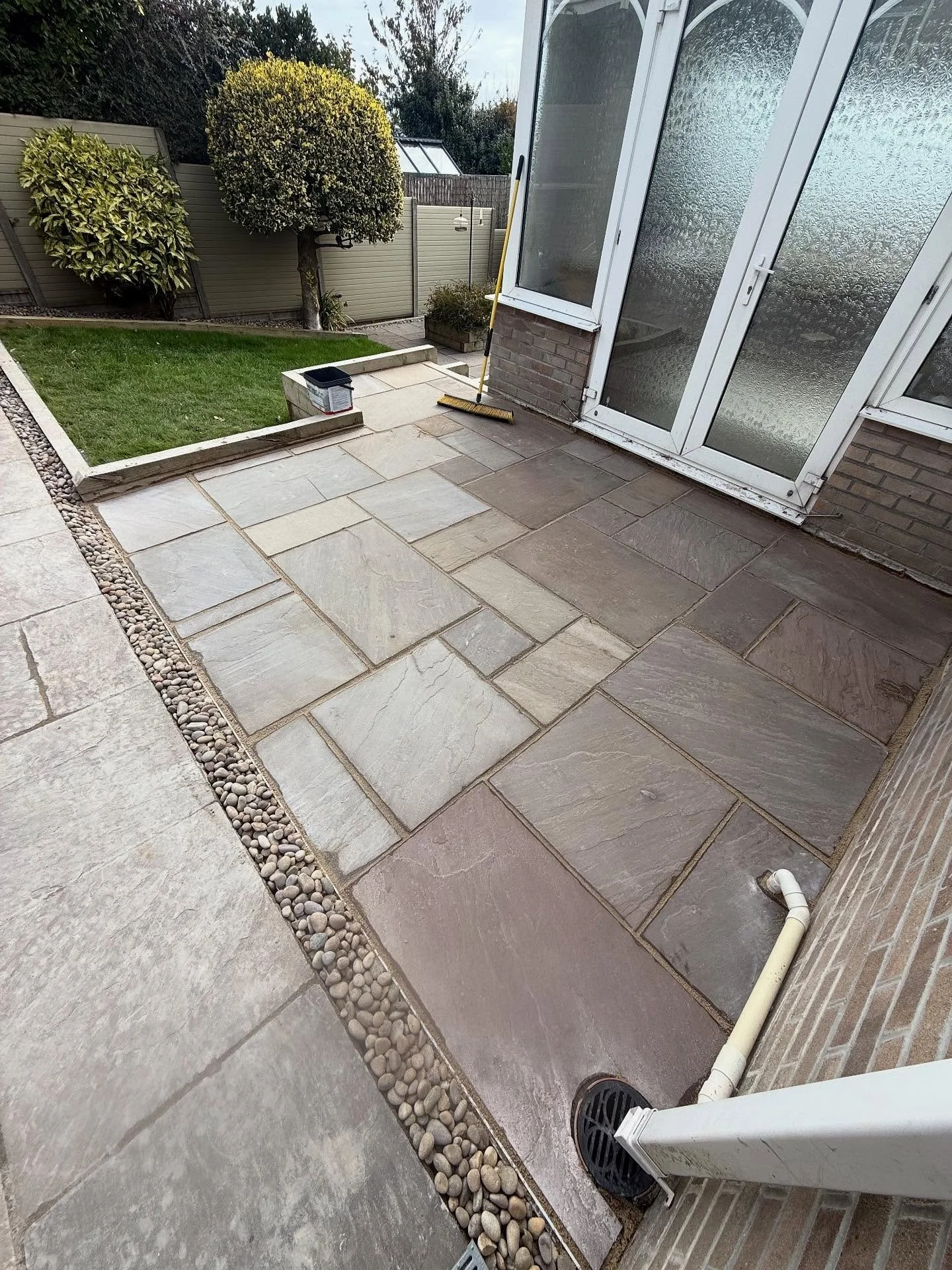 Phase 2 Hazeldown 👌🏼 

With drainage issues on how the patio was previously laid we took up the old and re set all new drainage levels and the patio fall.

Keeping the theme with decorative pebbles these were back filled within the drain crates sti