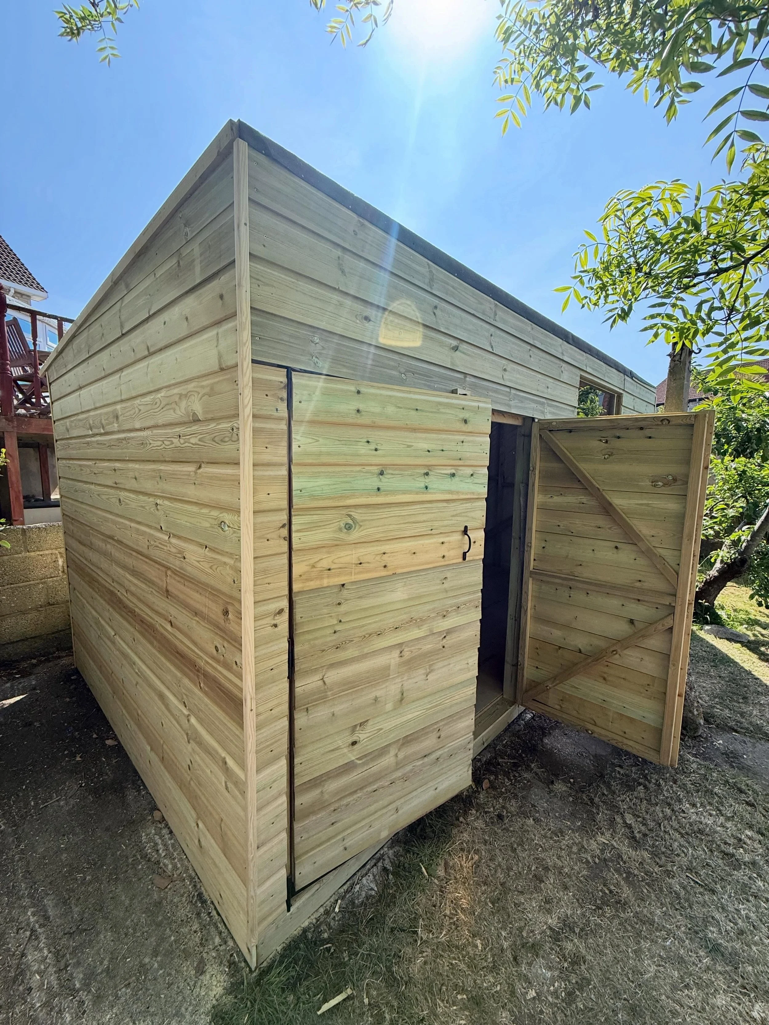Hand built custom treated shiplap Shed. 🪚 

5x3 metre build. Features:
- Treated shiplap and felt roof finish
- Chipboard floor base 
- Perspex glass window
- Double opening bolted doors.
- Damp protection all round with breathable water protection 