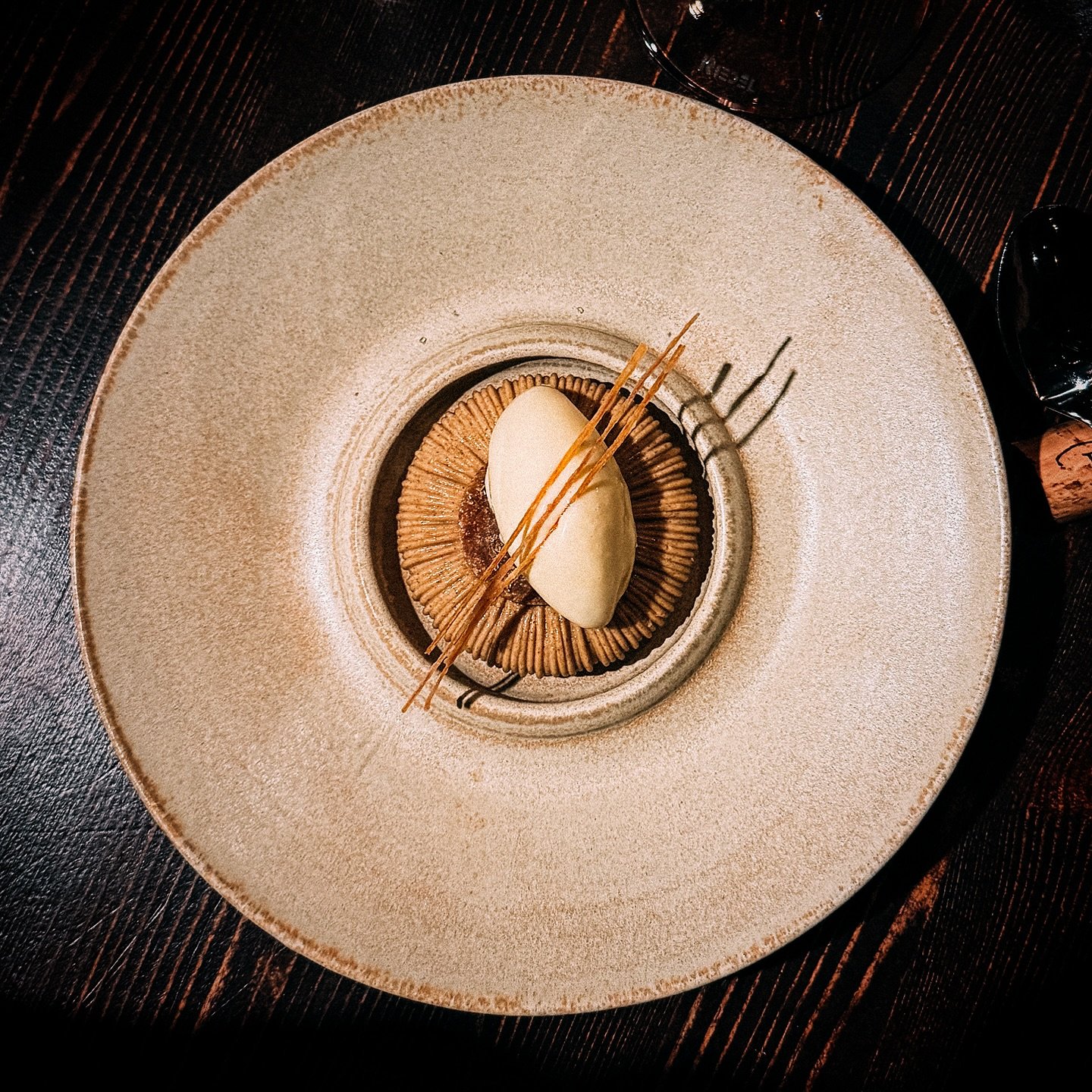 The dessert of our opening menu.
Mousse of roasted barley &amp; woodruff from our garden, koji ice cream &amp; a blueberry jam.

Do not miss the release of January tables on December 1st, 12 PM CET on our website.
.
.
.
#hundfj&auml;llet #s&auml;len 
