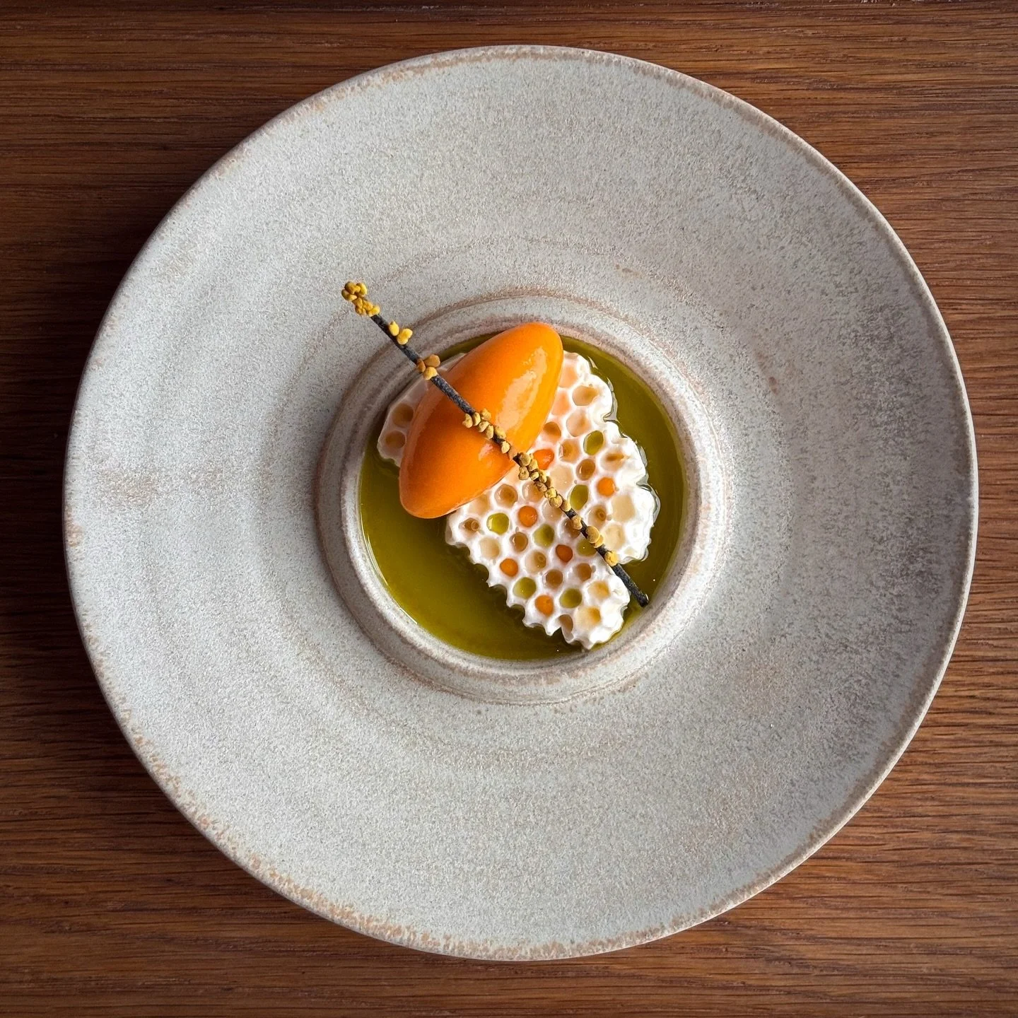 Frozen mousse of summer honey from Jerker in Morn&auml;s, honeycomb, sorb&eacute;t of sea buckthorn from Eva @solsyran &amp; pineapple weed oil.