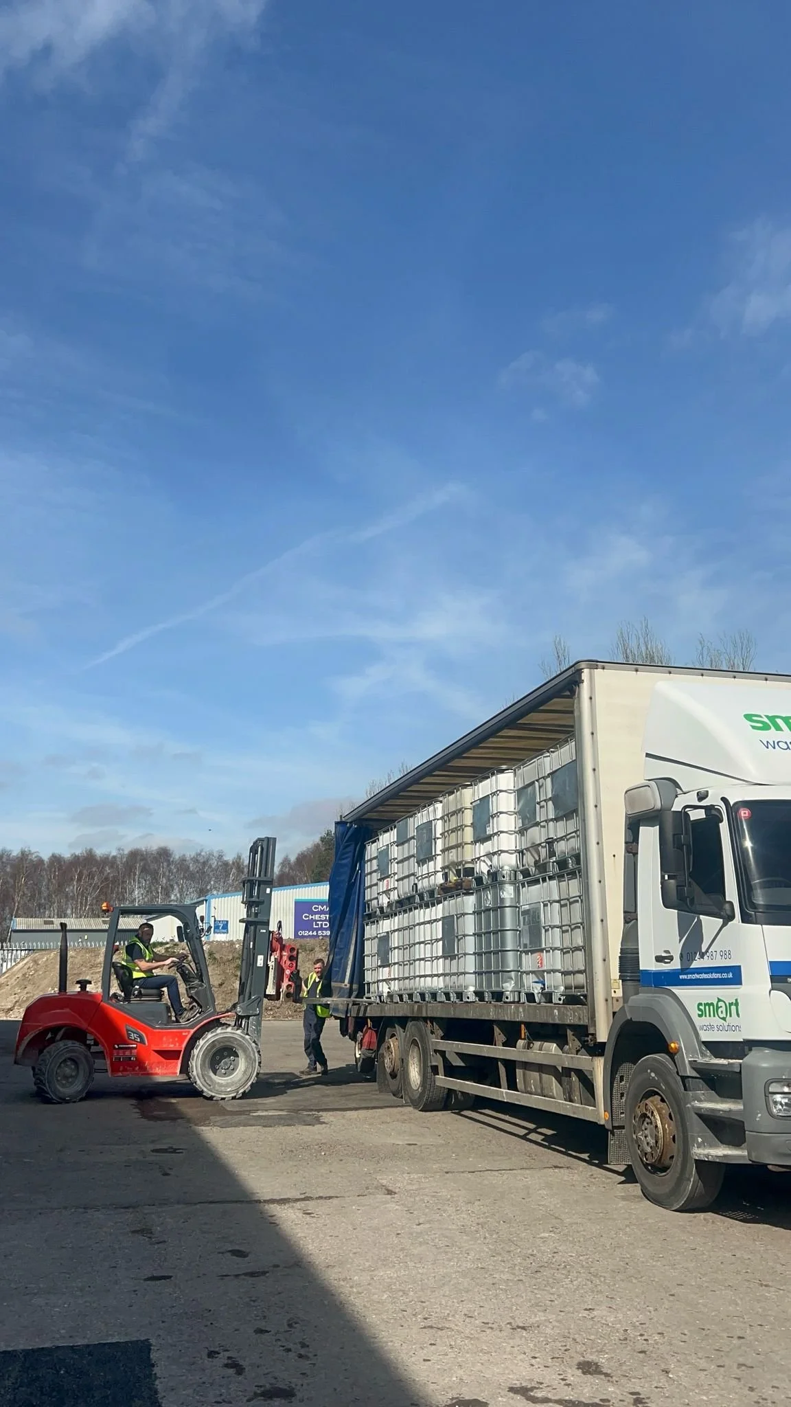 unpacking IBCs at new site.jpg