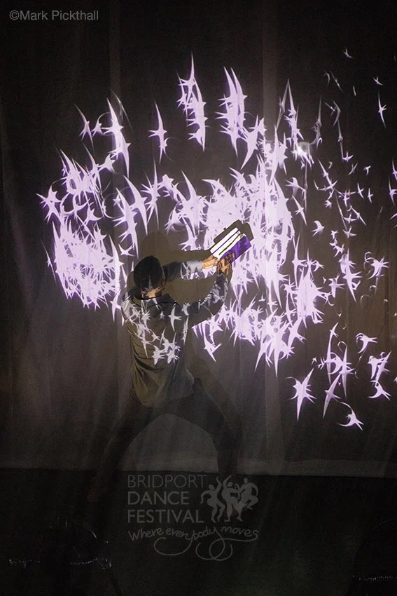 Little Murmur - Subash Viman Gorania. Here the birds symbolise birds which fly away - just how letters do for people dealing with dyslexia. Spectacular dance & lights. Special thanks to the Bridport Arts Centre