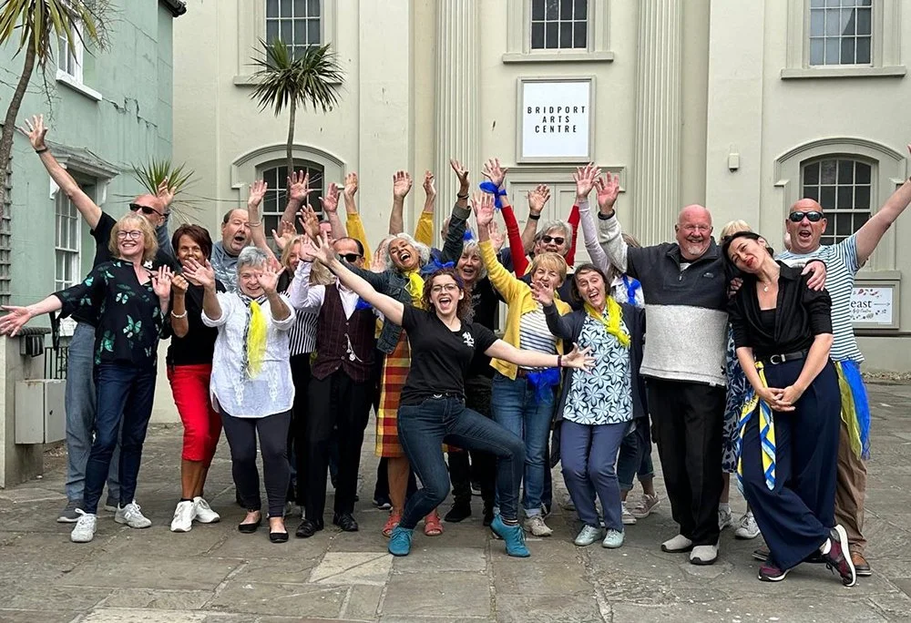 Flash mob with delightful Dee Lanning Dynamic Dance in front of the Bridport Art's Centre