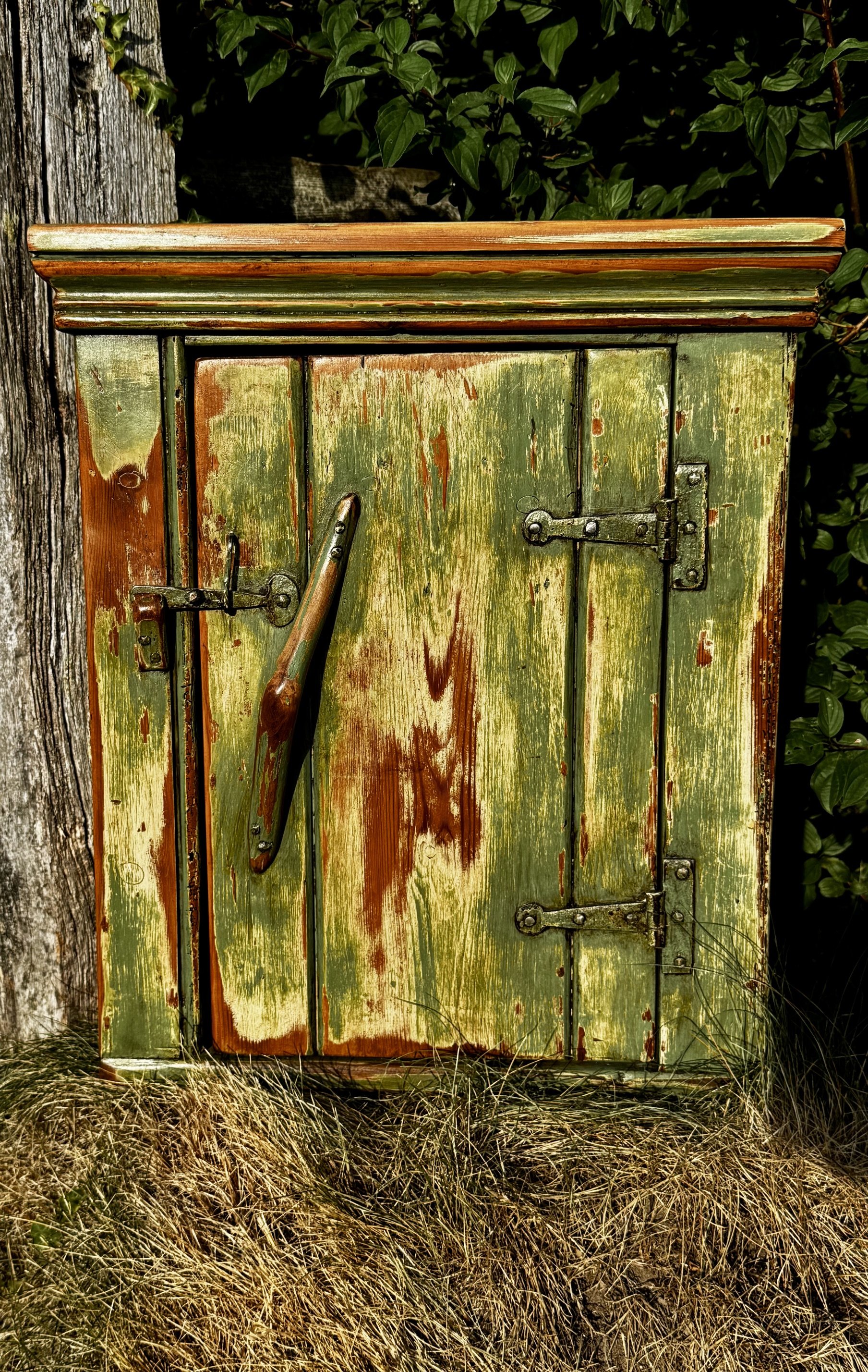 'Curious Cupboard' with aged green painted finish