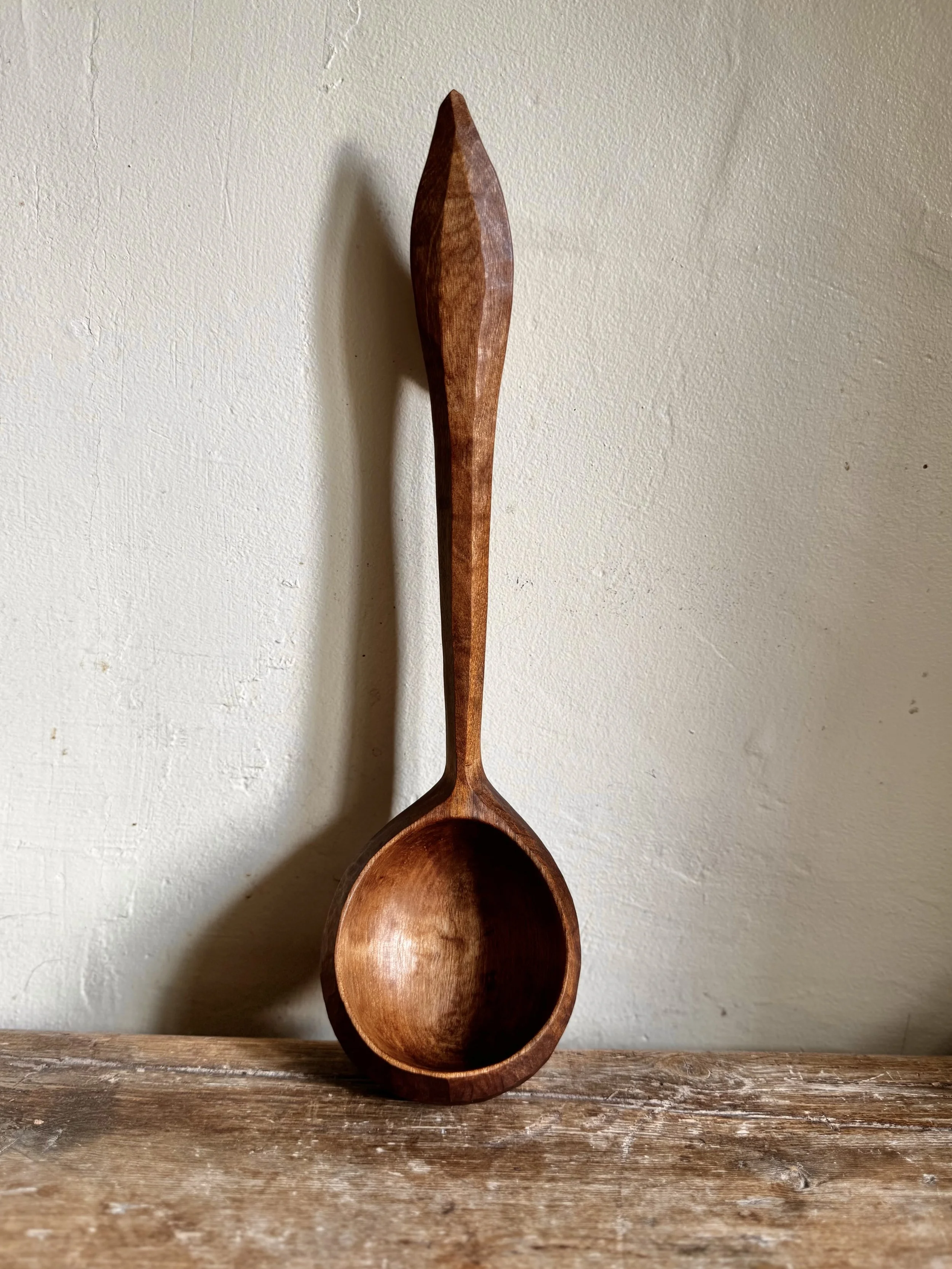 Hand carved birch ladle with hanging hook.jpg