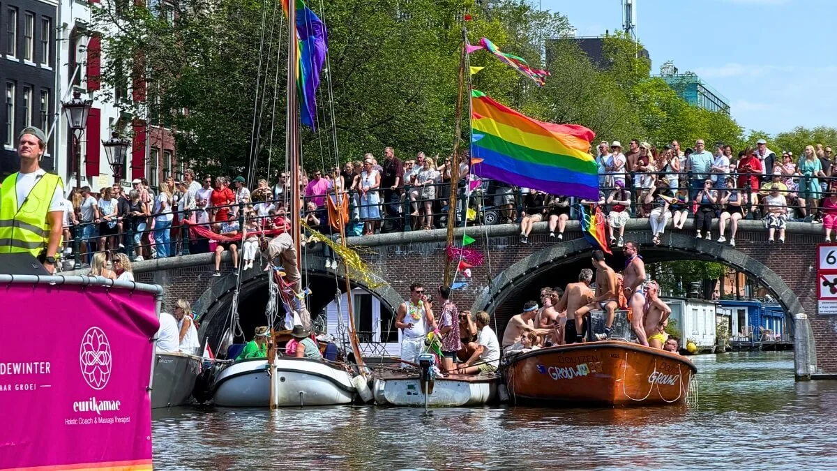 LGBTQ+ Pride boats and rainbow flags during Amsterdam Canal Pride at WorldPride 2026