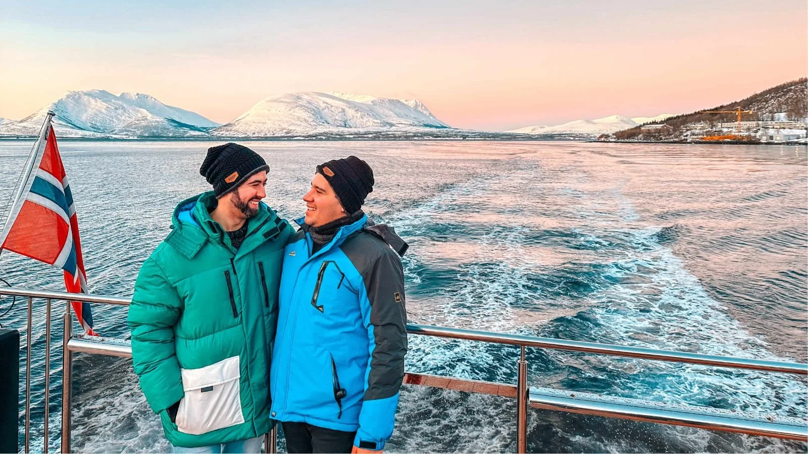 Gay couple visiting Tromsø, Norway during winter