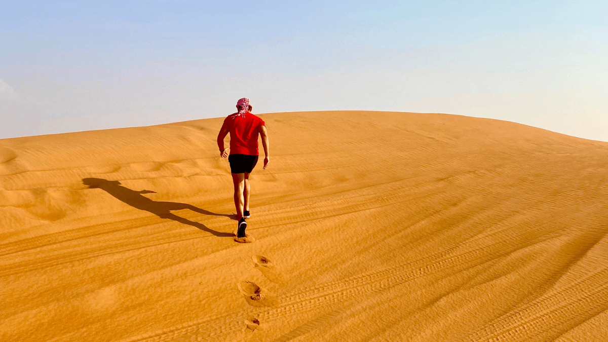 Gay traveler in the desert in Dubai, UAE